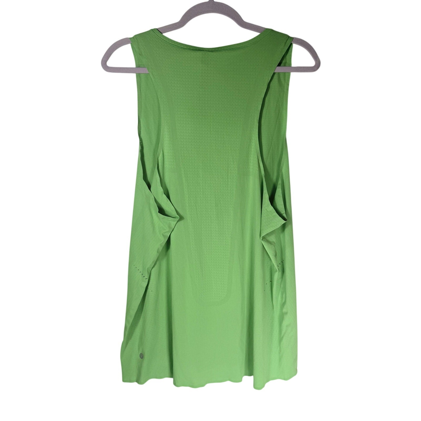 Lululemon women's lime green open-back athletic tank top, size XL, shown on a hanger with a close-up of the fabric and design details.
