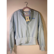 Blue Wilo The Label Wellness Club crop zip hoodie for women, size M, featuring a hood and front zipper.