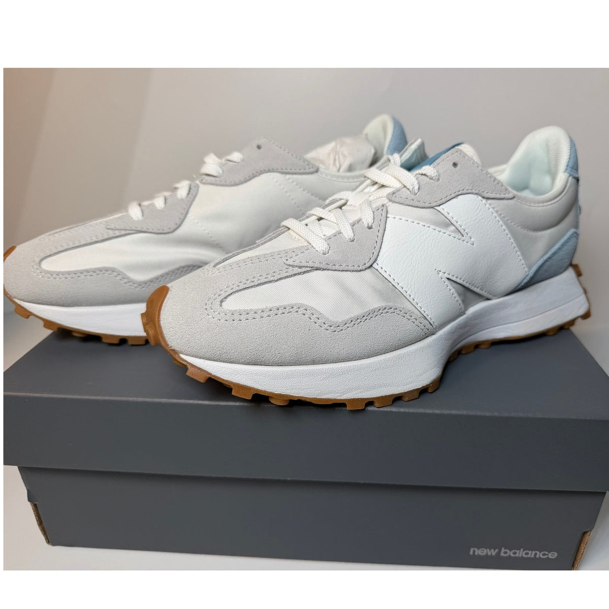 Adidas New Balance 327 sneakers in reflection bright grey, women's size 9 and men's size 7.5, showing side view with stylish design.