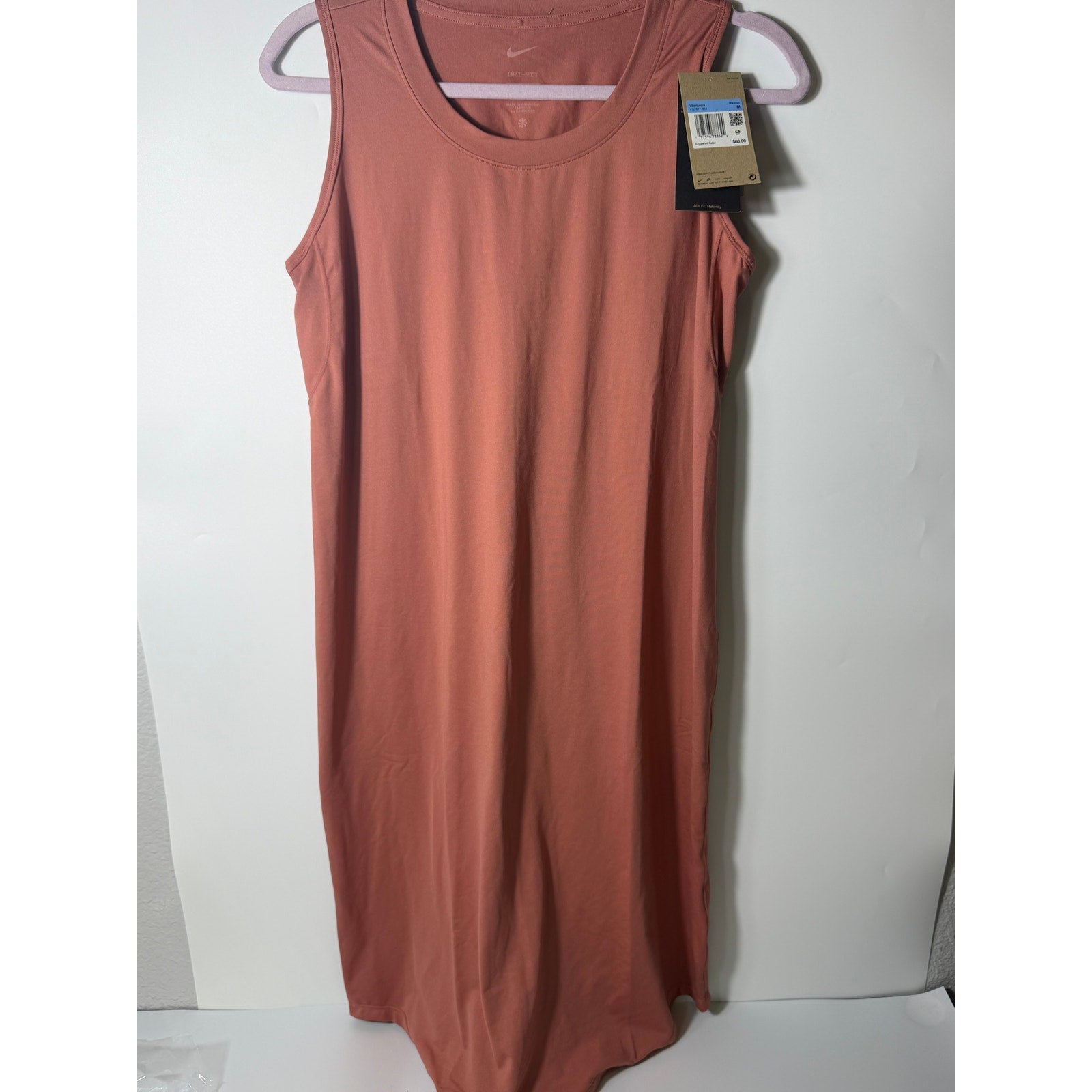 Nike Dri-FIT maternity sleeveless midi dress for women, medium pink, lightweight and comfortable for active wear.
