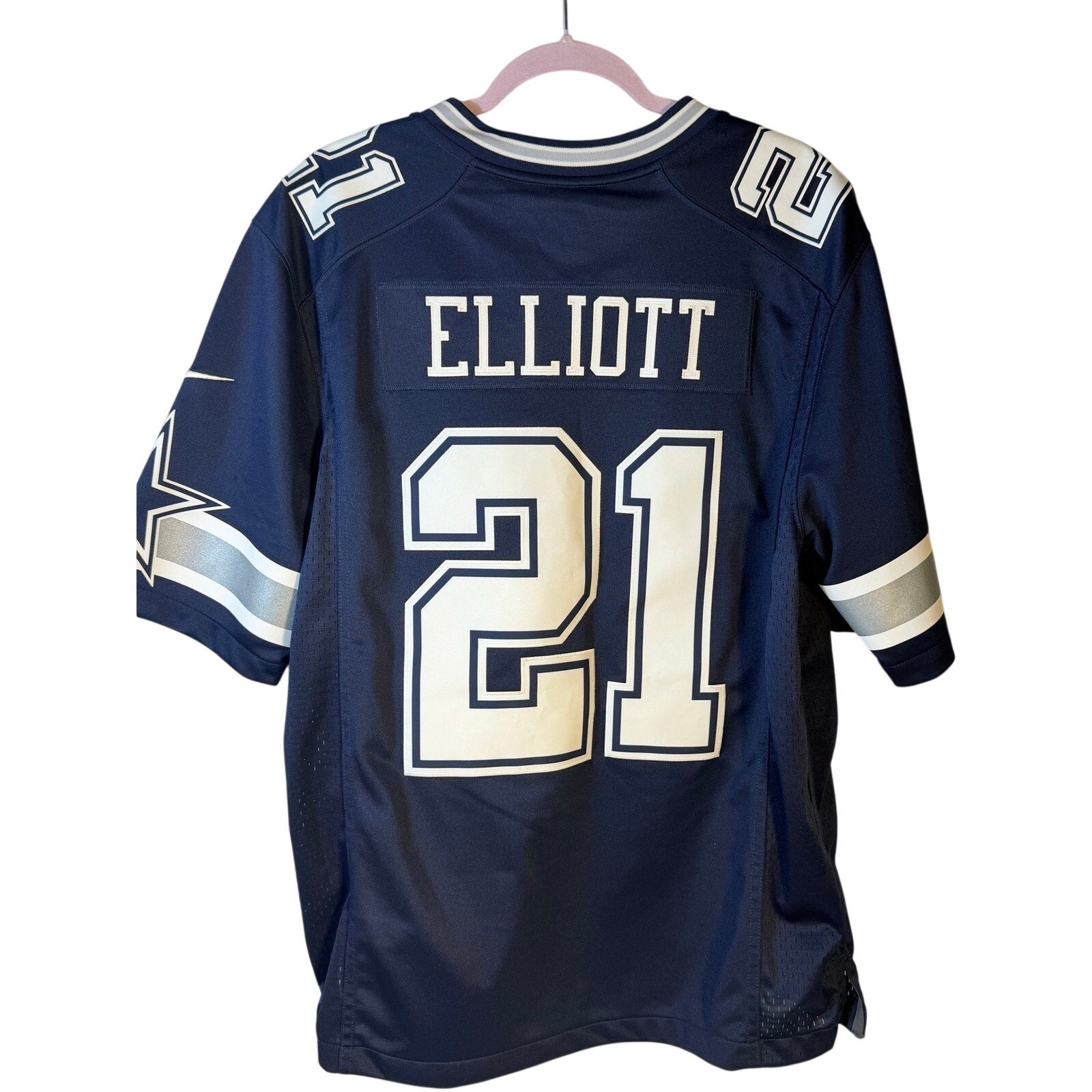 Nike Dallas Cowboys Ezekiel Elliott #21 NFL game jersey for men, large size, navy color, featuring player name and number.