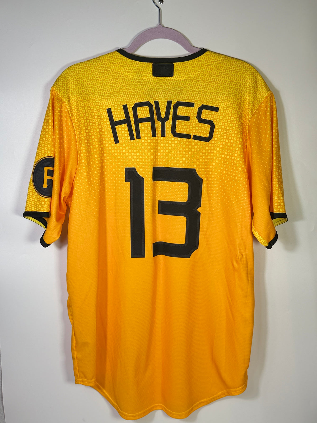 Nike Pittsburgh Pirates Ke'Bryan Hayes MLB yellow jersey, medium size, with team logo and player name visible on the front.