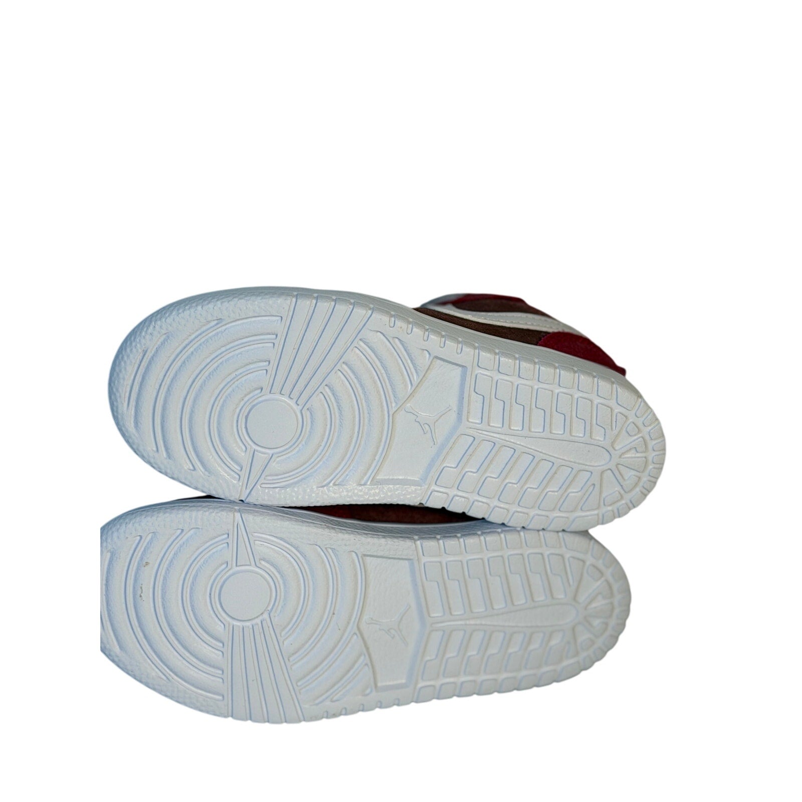 Red, brown, and white Air Jordan 1 Low ALT toddler sneakers with hook-and-loop straps, designed for young children.