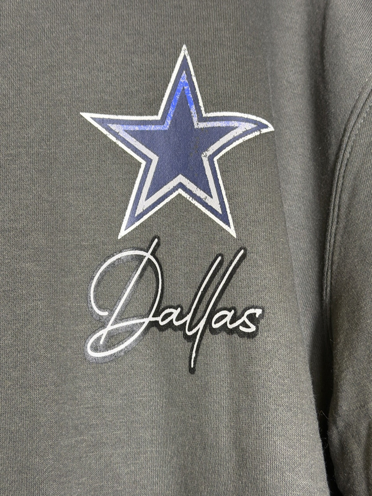 Unisex Olive Gray Dallas Cowboys NFL crewneck sweatshirt with team logo, soft fabric, and ribbed cuffs.
