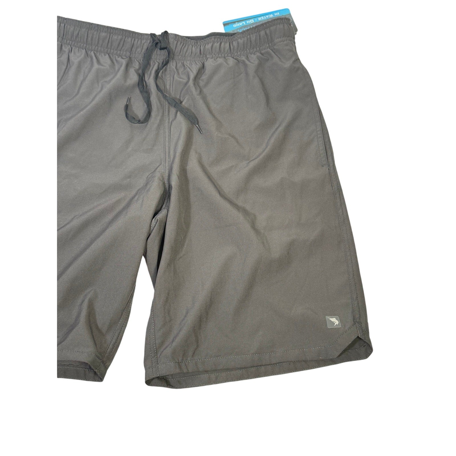 Salt Life men's black Breaker Performance Hybrid Shorts, medium size, shown on model with a casual fit and athletic style.