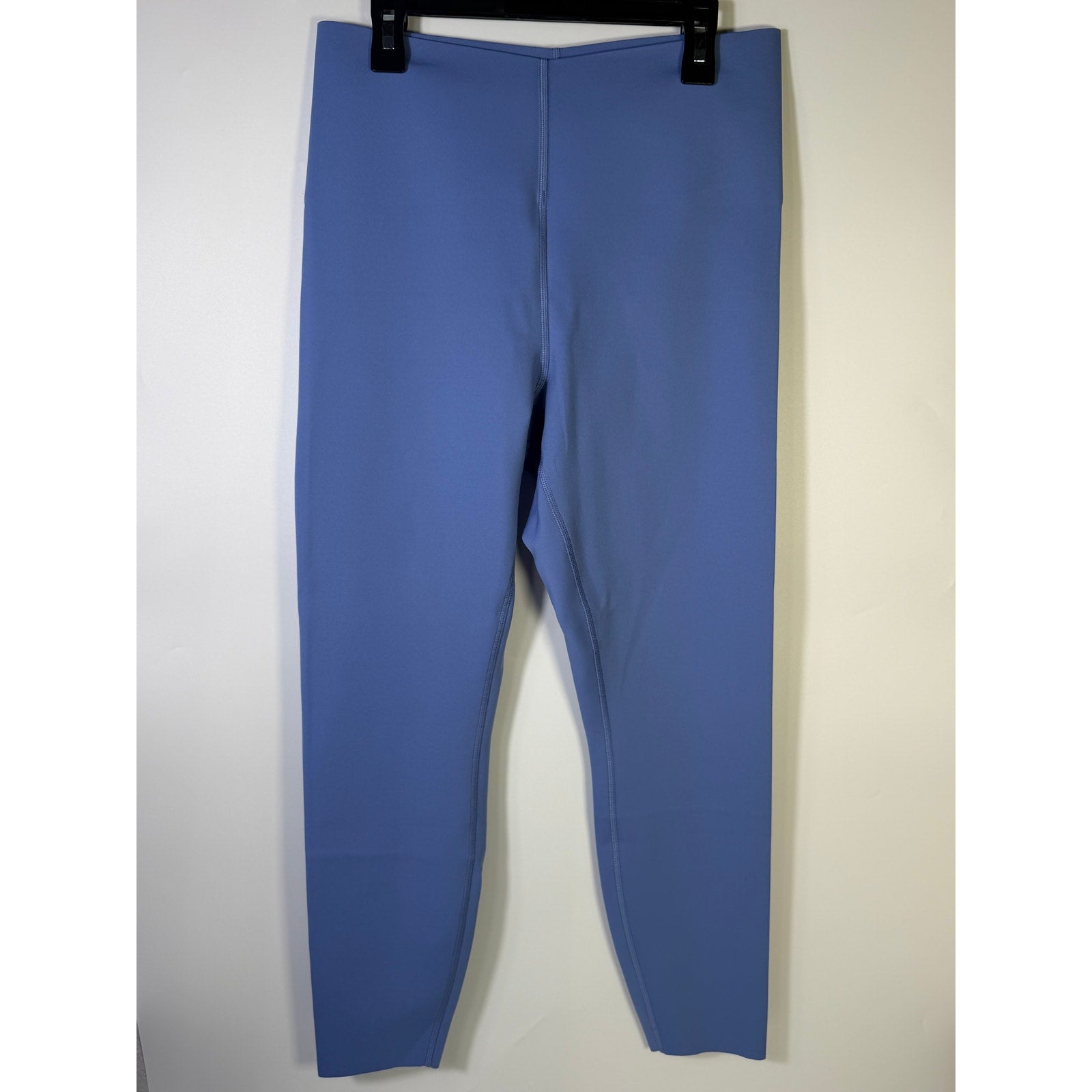 Lululemon Glow Up SHR Tight 25-inch women's blue leggings with a fitted design and elastic waistband.