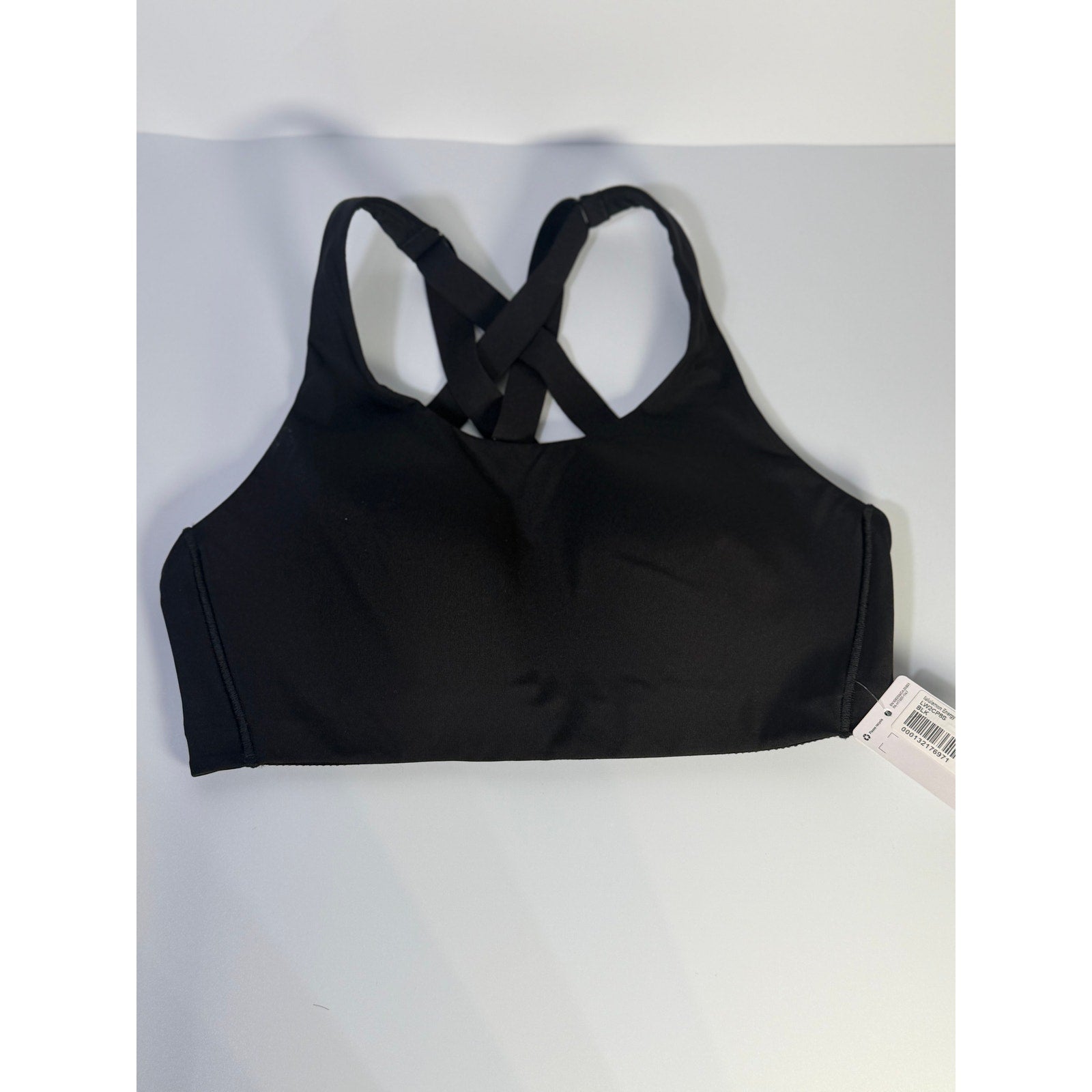 Black Lululemon Energy Sports Bra with high support, 34C size, new with tags, featuring a sleek athletic design.