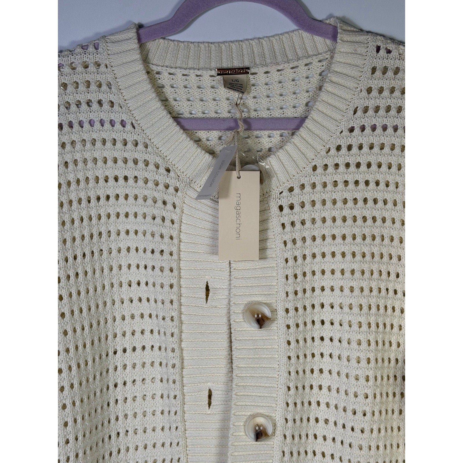 Magaschoni women's cream open-knit button cardigan sweater, size large, featuring a soft knit texture and stylish design.