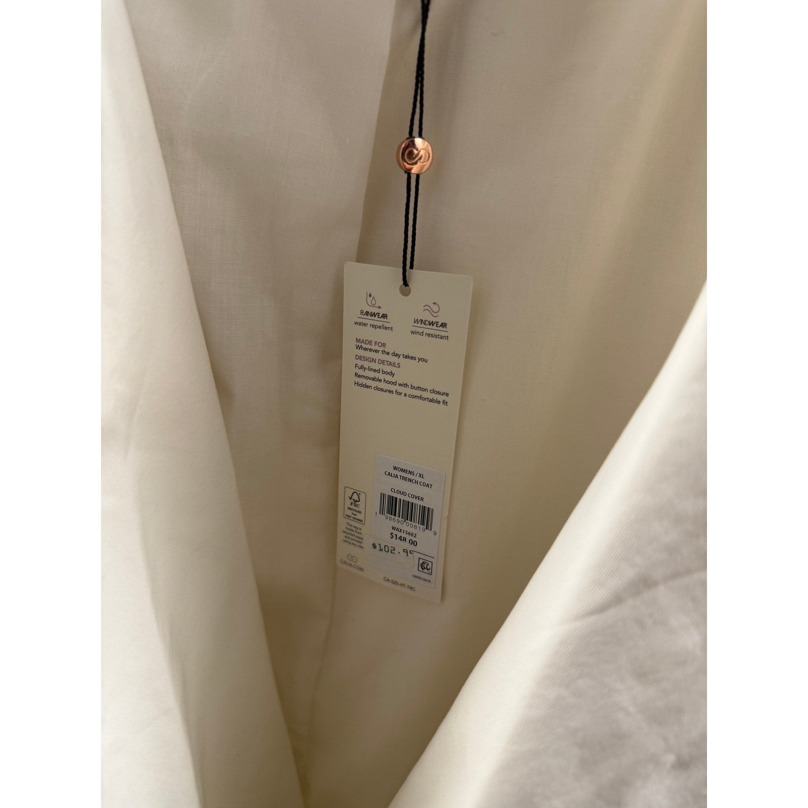 Calia women's hooded trench coat in cream with belt, lightweight jacket, shown with hood up and front view.