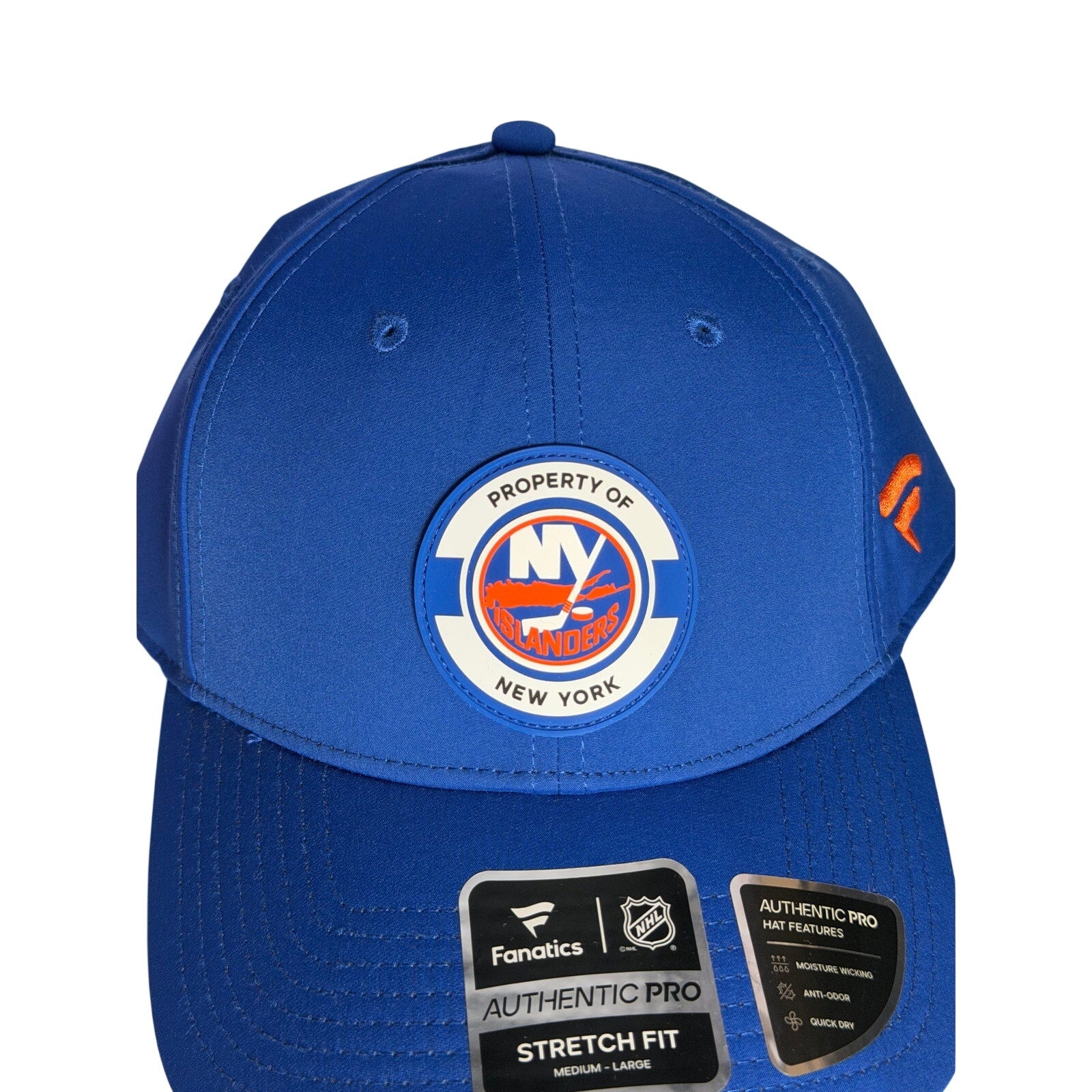 Fanatics New York Islanders authentic blue stretch fit hat, M/L size, with team logo and structured design.