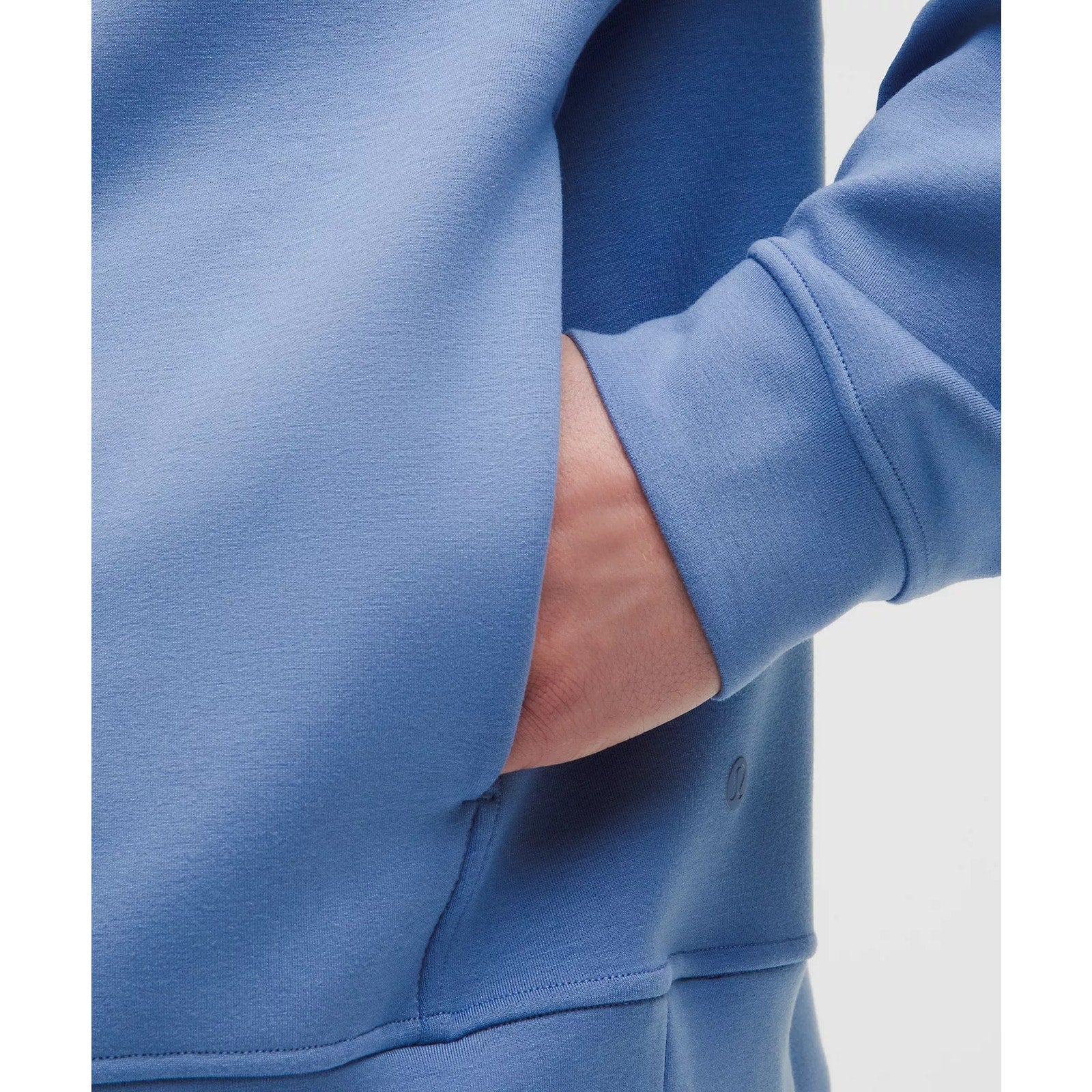 Men's blue Lululemon Smooth Spacer Quarter Zip sweatshirt, small size, showing the lightweight fabric and quarter zip design.