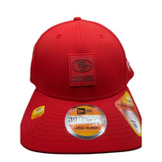Red San Francisco 49ers NFL New Era 39THIRTY stretch fit hat, size L/XL, with team logo and curved brim.