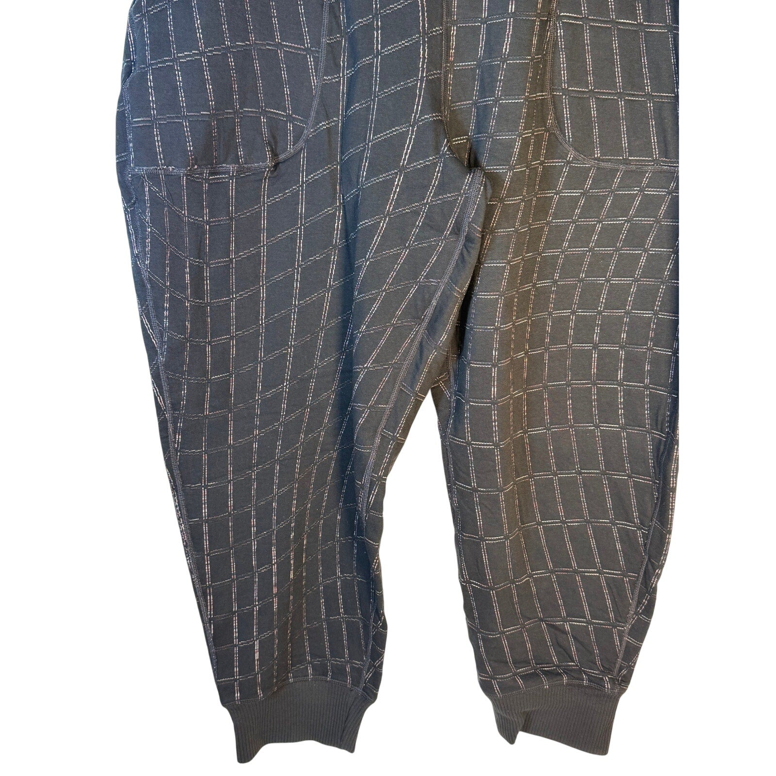 Nike Women's black Yoga Luxe Grid Print jogger pants, XL size, featuring comfortable fabric and stylish design for training.