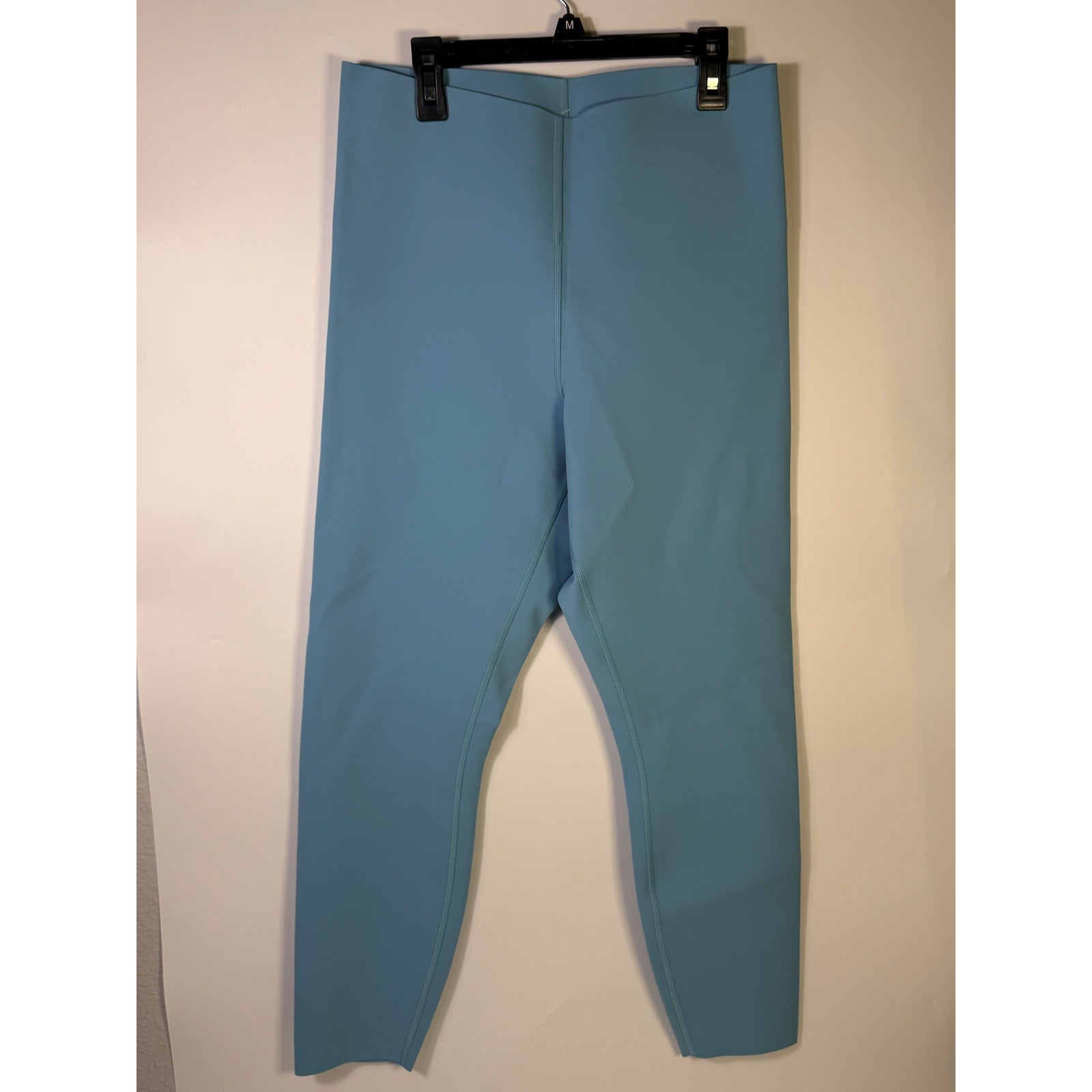 Lululemon Glow Up HR Tight 25-inch women's leggings in Windmill Blue, showing the fitted waistband and smooth fabric.