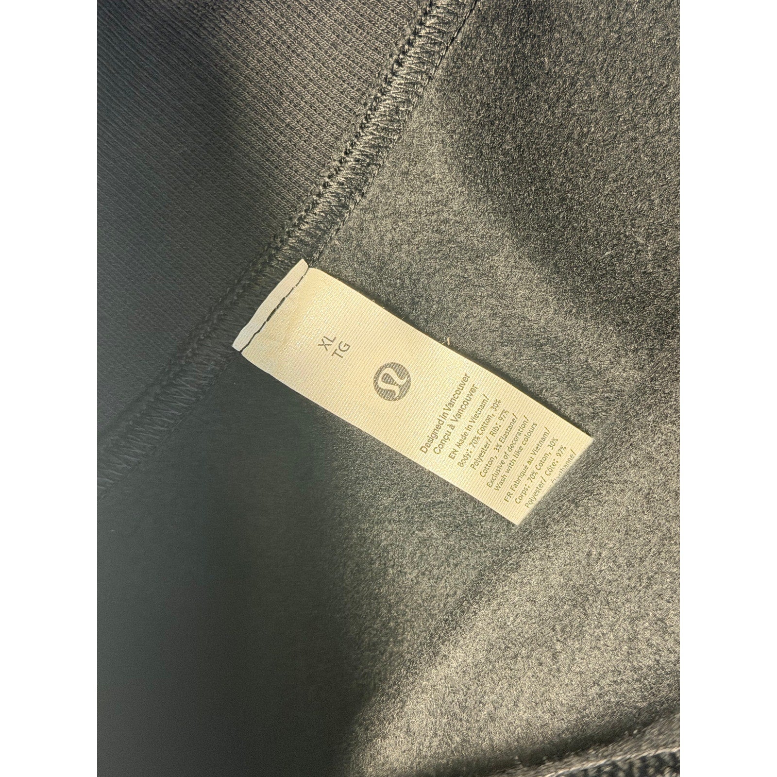 Lululemon black Scuba HR Mini Skirt for women, XL size, fleece material, above knee length, casual athletic style.