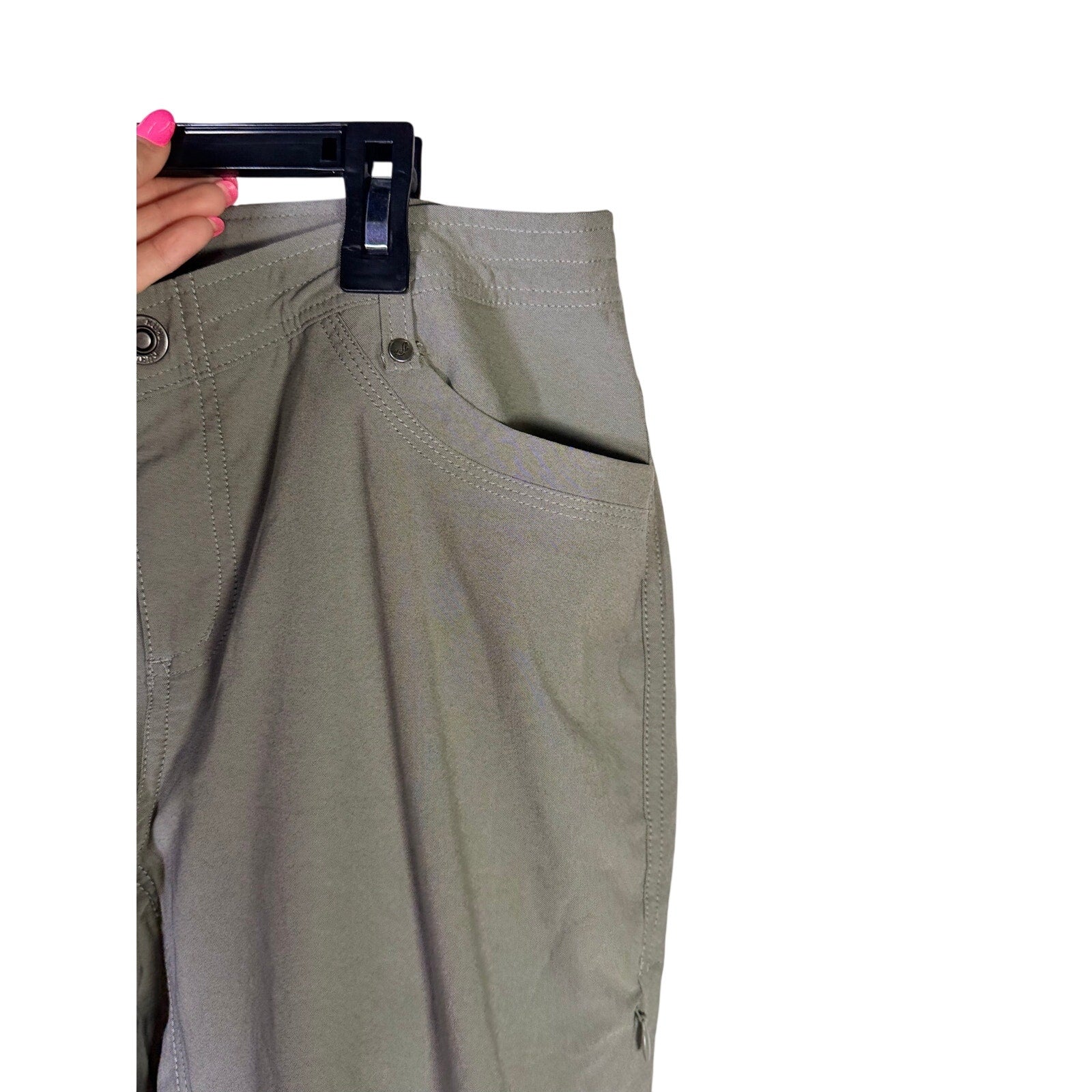 KÜHL women's gray hiking performance pants, size 12 long, showing the comfortable fabric and tailored fit for outdoor activity.