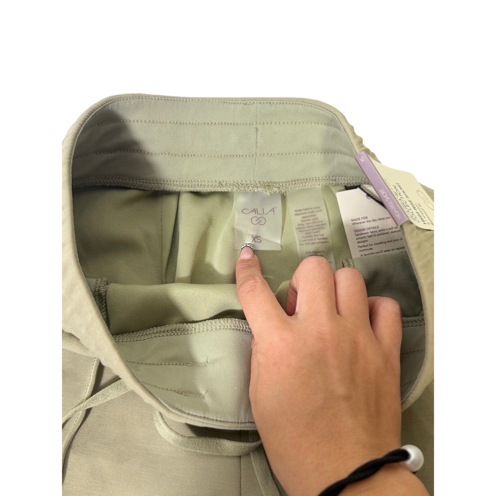 Calia women’s sage green cargo shorts with drawstring waist, size XS, casual utility style, new with tags.