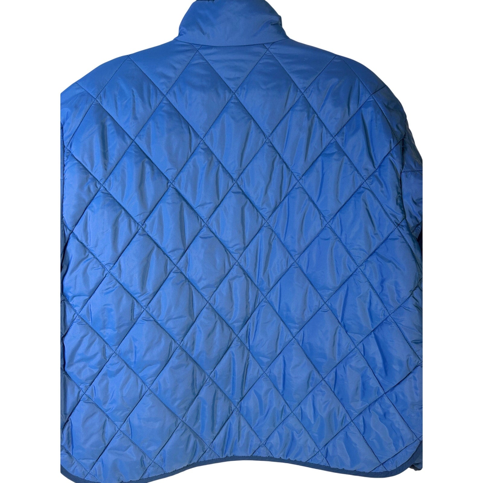 DSG women's water-repellent quilted anorak jacket in Mountain Lake Blue, small size, displayed on a hanger.