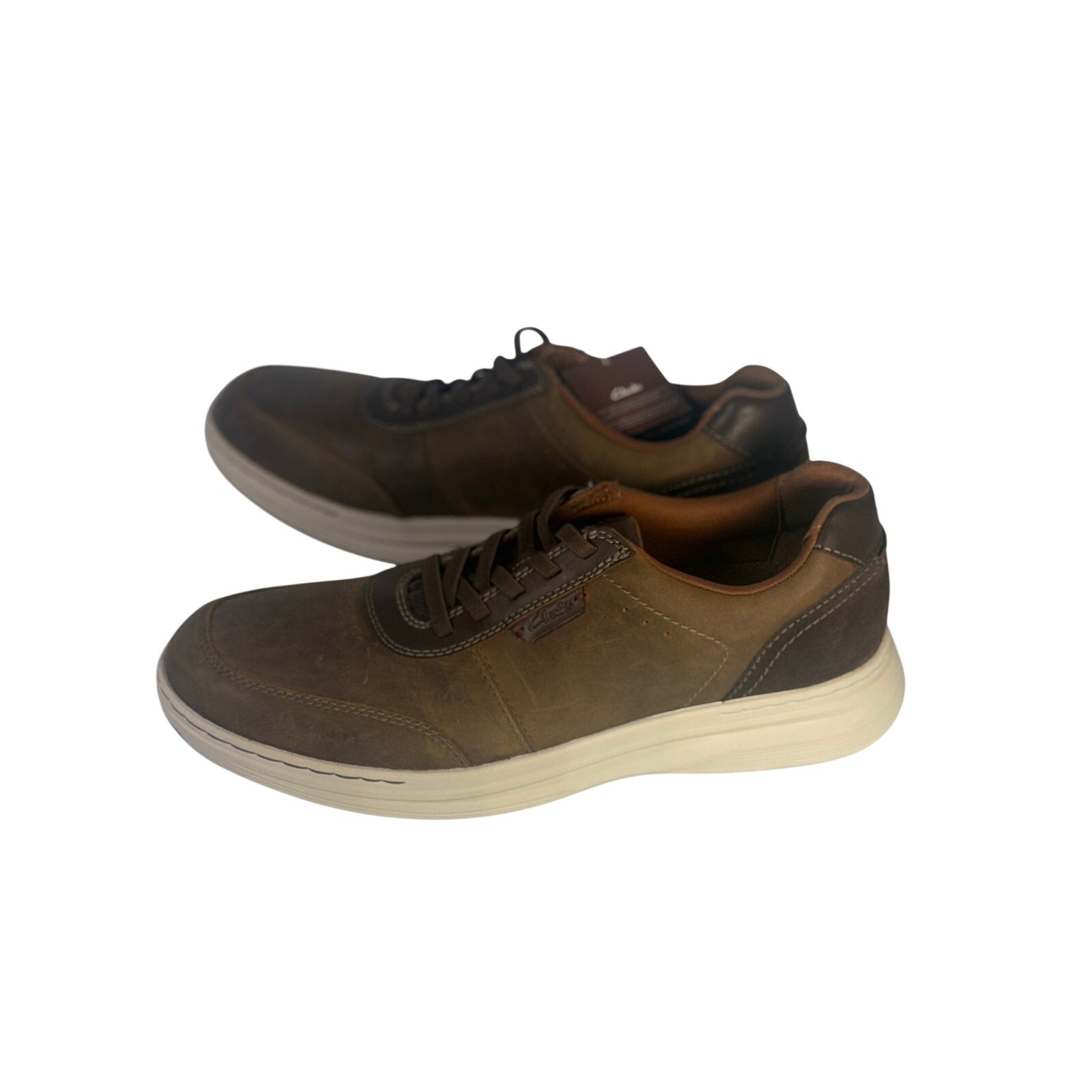Clarks men's brown casual golf sneakers with lace-up design, size 10 M, new in box, featuring comfortable athletic style.