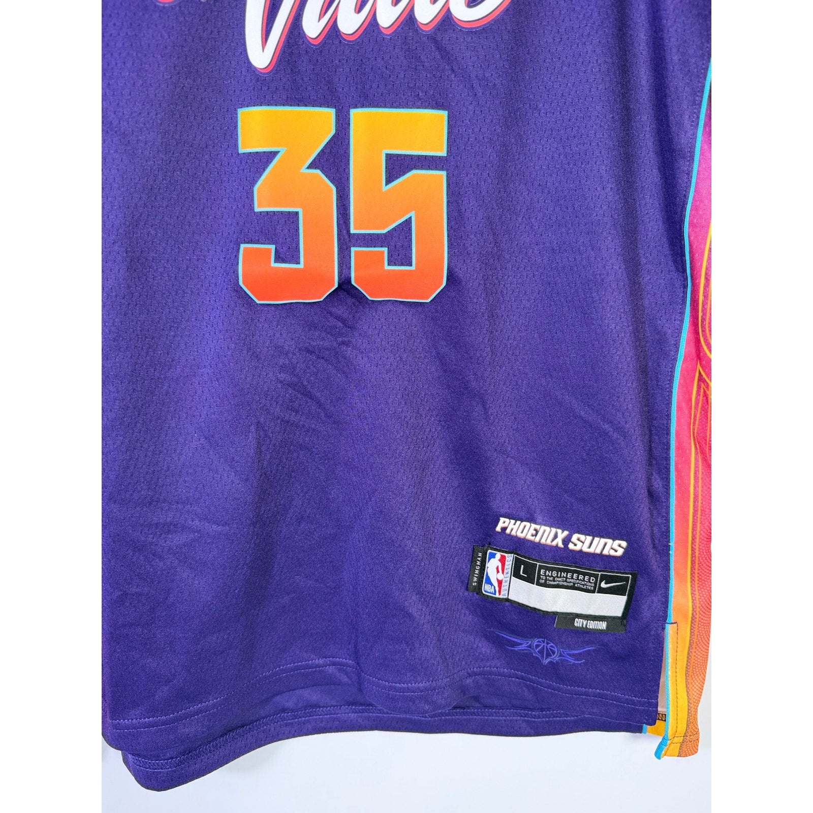 Nike Phoenix Suns Kevin Durant #35 City Edition youth jersey, size L 14/16, featuring team logo and Durant's name on the back.