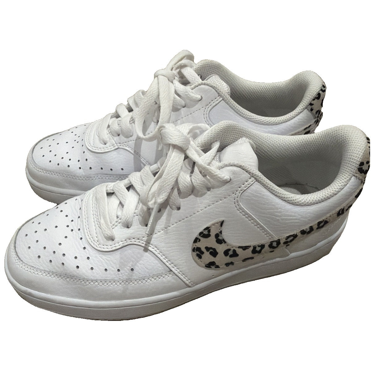 Nike Court Vision Low Leopard Swoosh white sneakers for women, size 8.5, featuring leopard print accents and Nike branding.