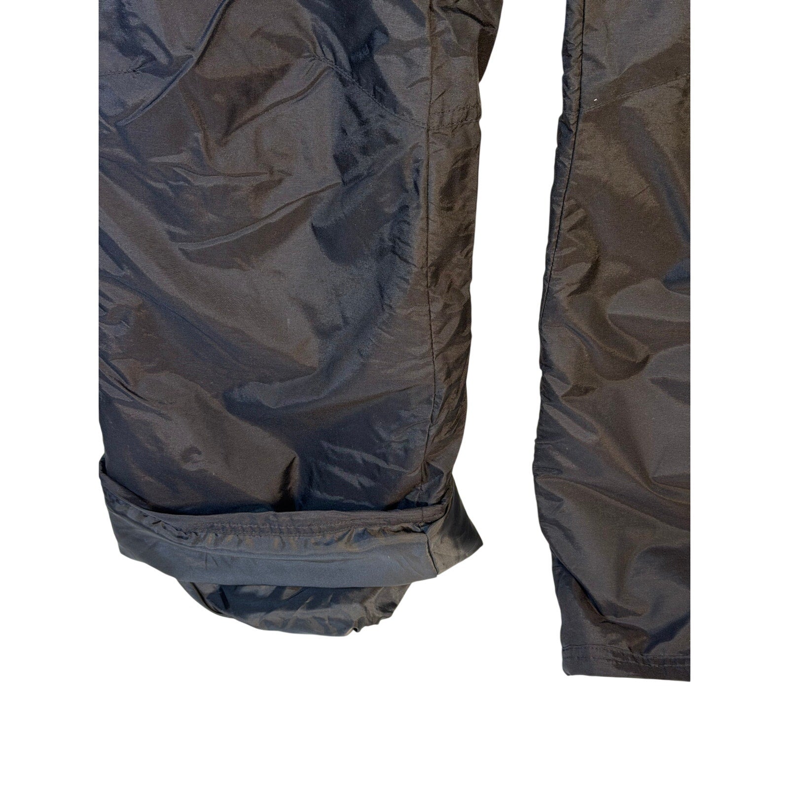 Black Outdoor Gear boys' insulated snow ski pants with adjustable straps and waterproof fabric, suitable for winter snow activities.