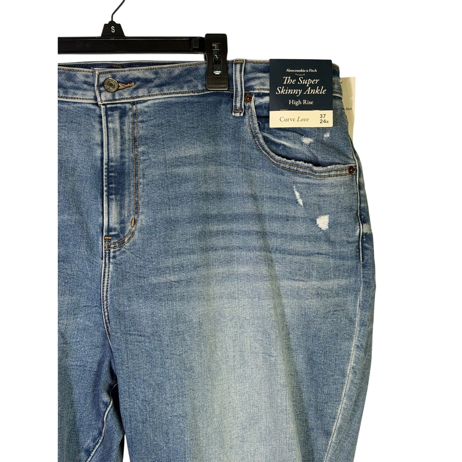 Abercrombie & Fitch Curve Love super skinny ankle jeans for women, size 37, shown folded on a flat surface.