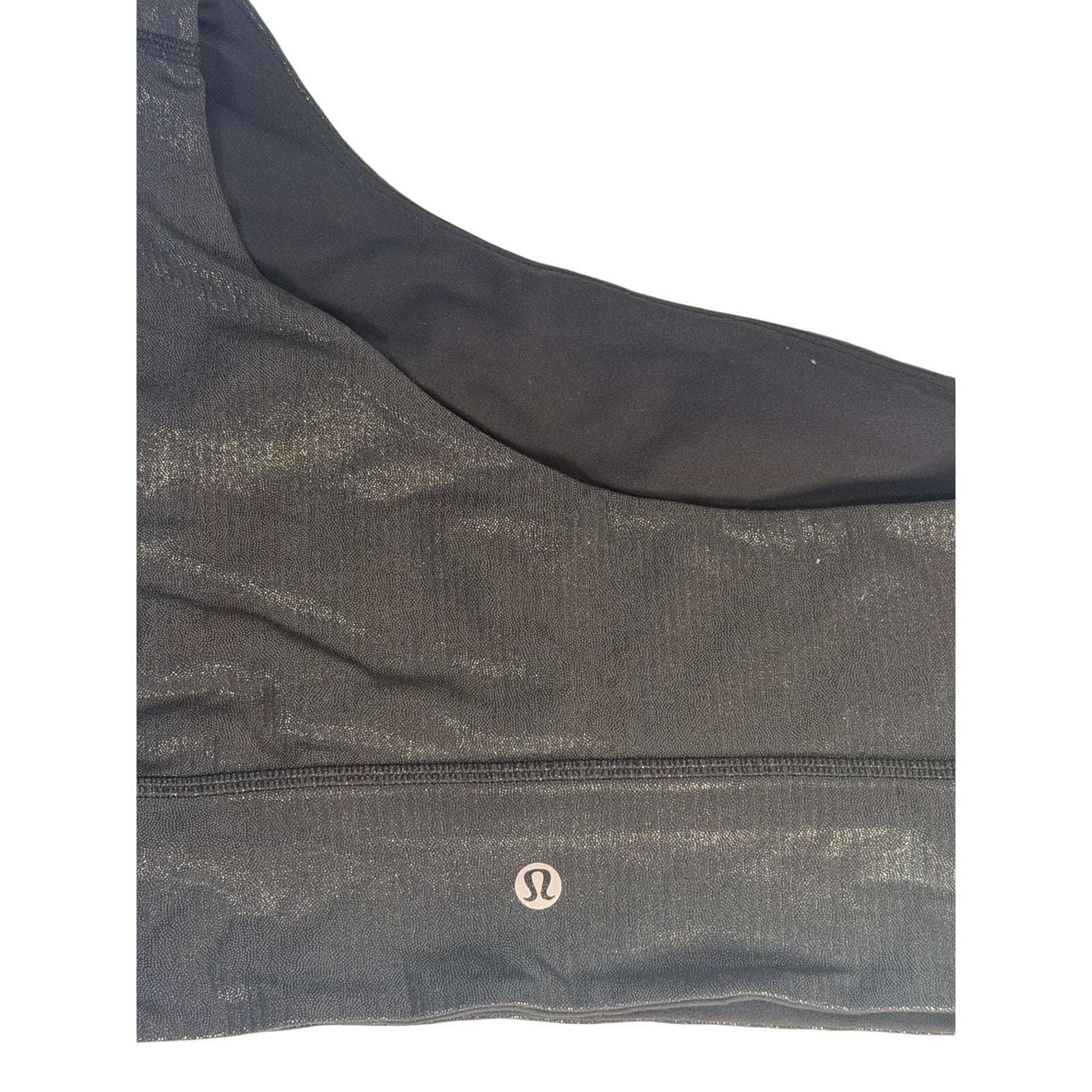 Lululemon women's black one-shoulder foil sports bra size 8, featuring sleek design and supportive fit for active wear.