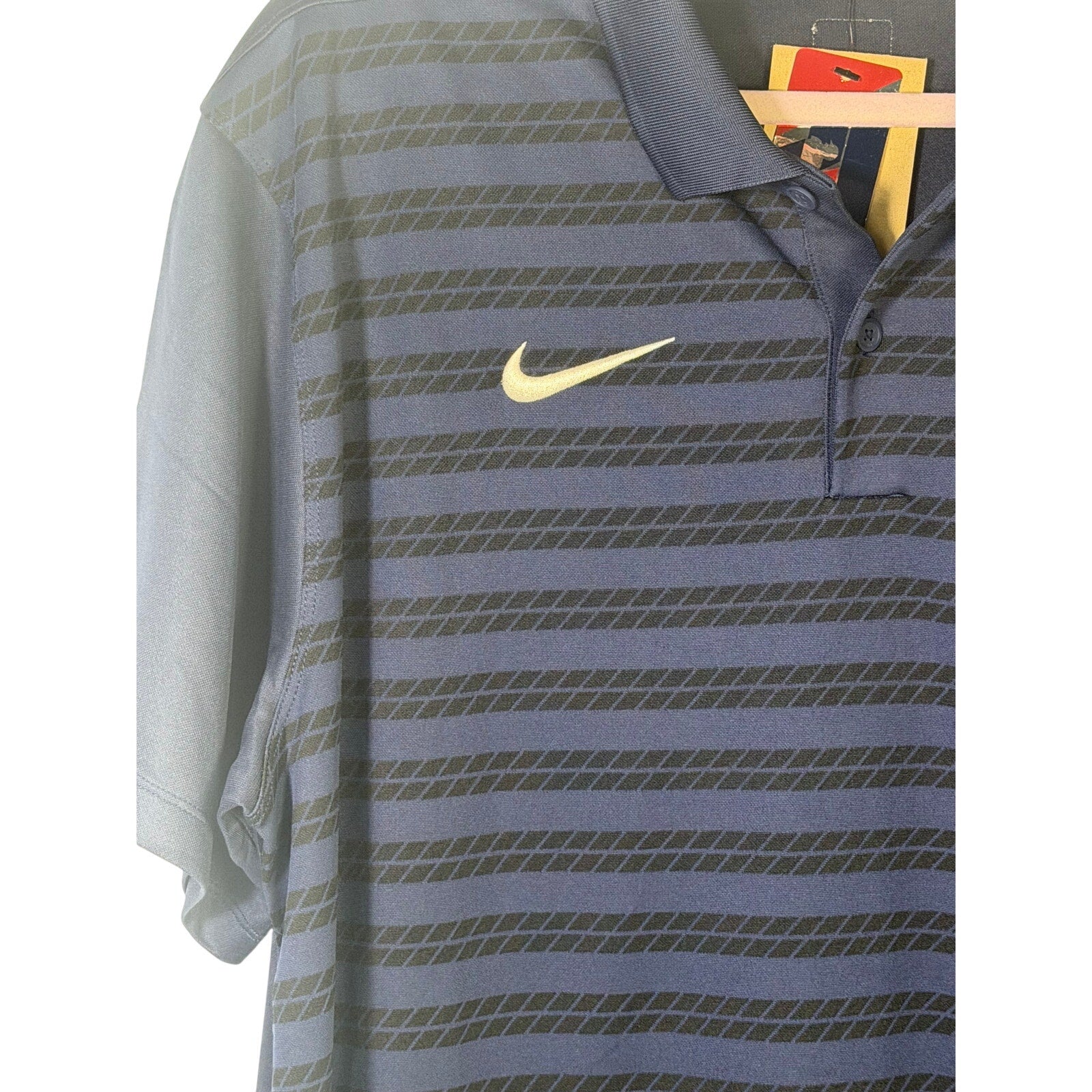 Nike Atlanta Braves men's Dri-FIT polo shirt in navy, size L, with team logo, made for comfort and athletic style.