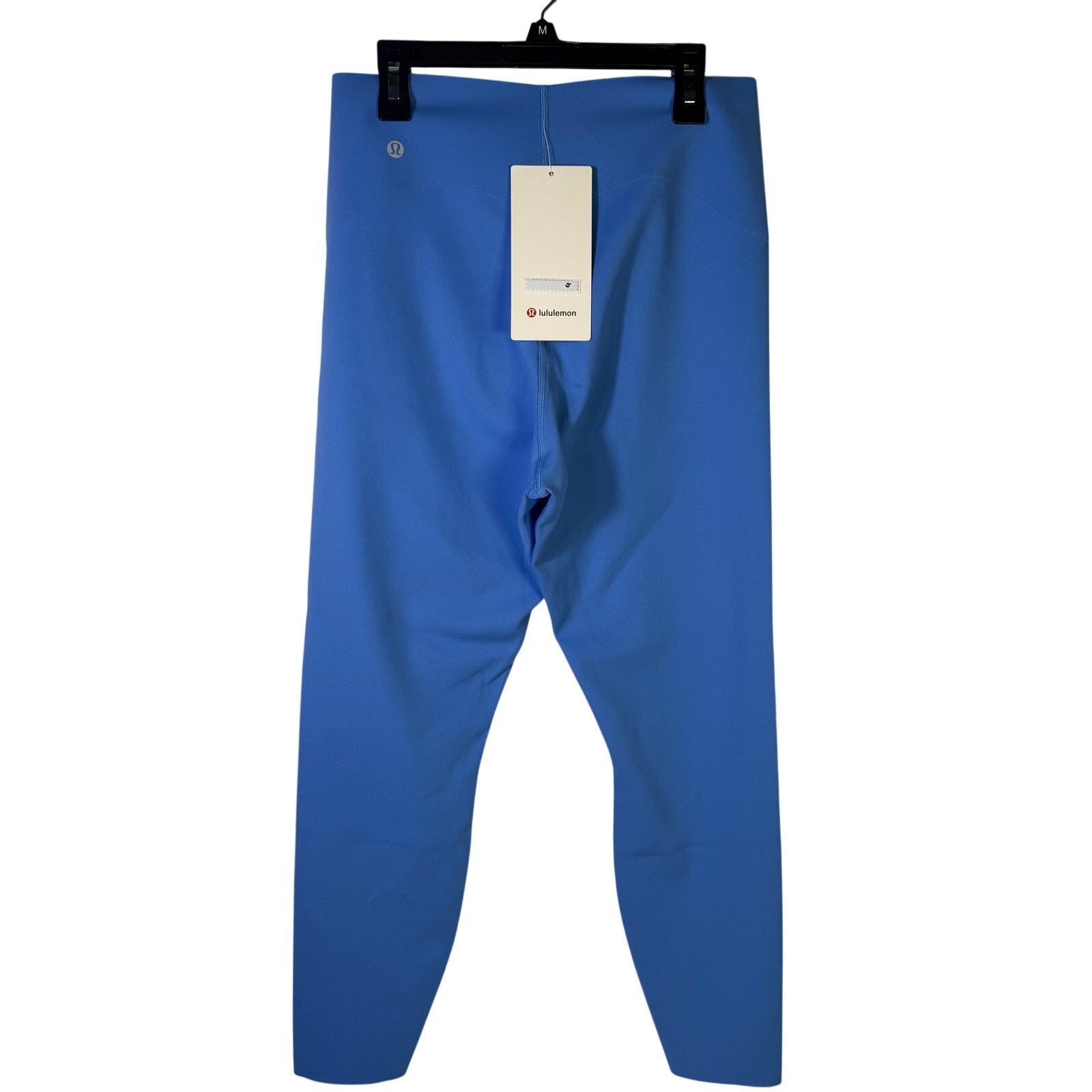 Lululemon Glow Up high-rise leggings in Pool Party Blue, 25-inch length, size 10, shown on a model.