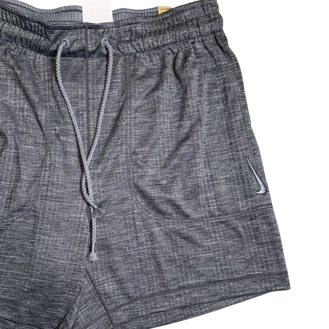 Nike men's gray Dri-FIT yoga shorts with drawstring waistband, lightweight and comfortable for active wear.