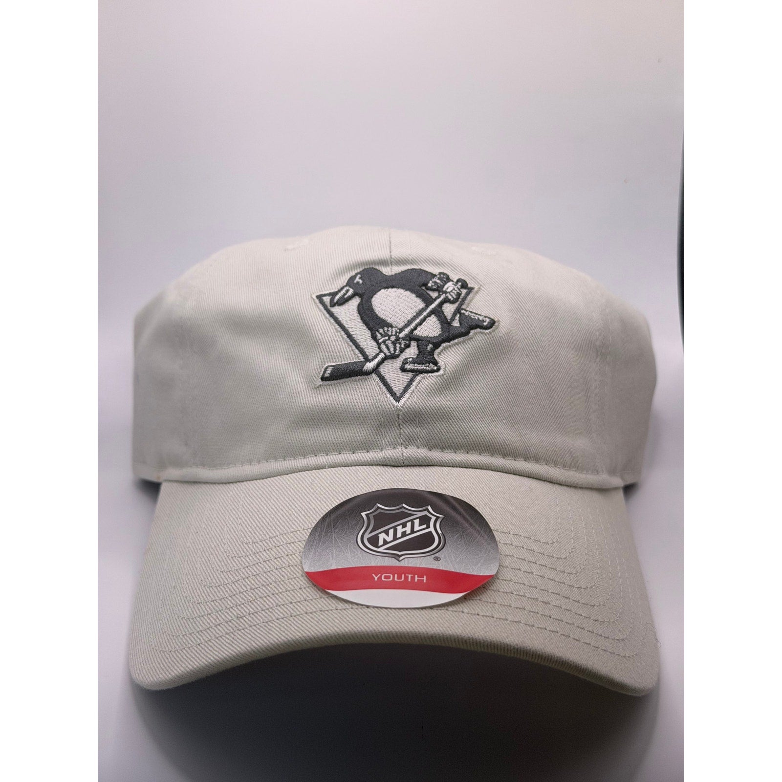 NHL Pittsburgh Penguins youth adjustable beige strapback hat cap, one size, with team logo and classic baseball style.