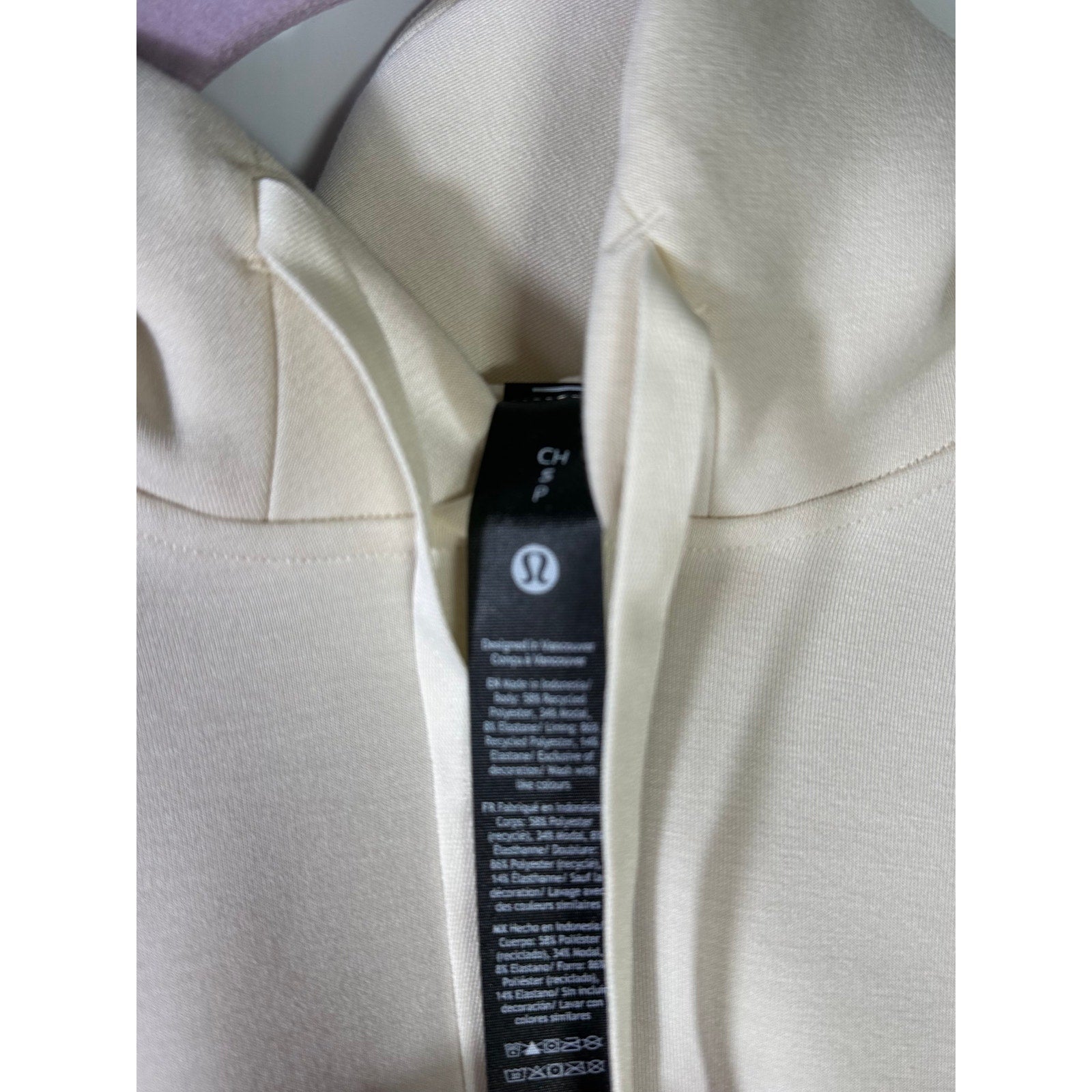 Lululemon women's Smooth Spacer Pullover Hoodie in size small, new with tags, showing the soft fabric and relaxed fit.