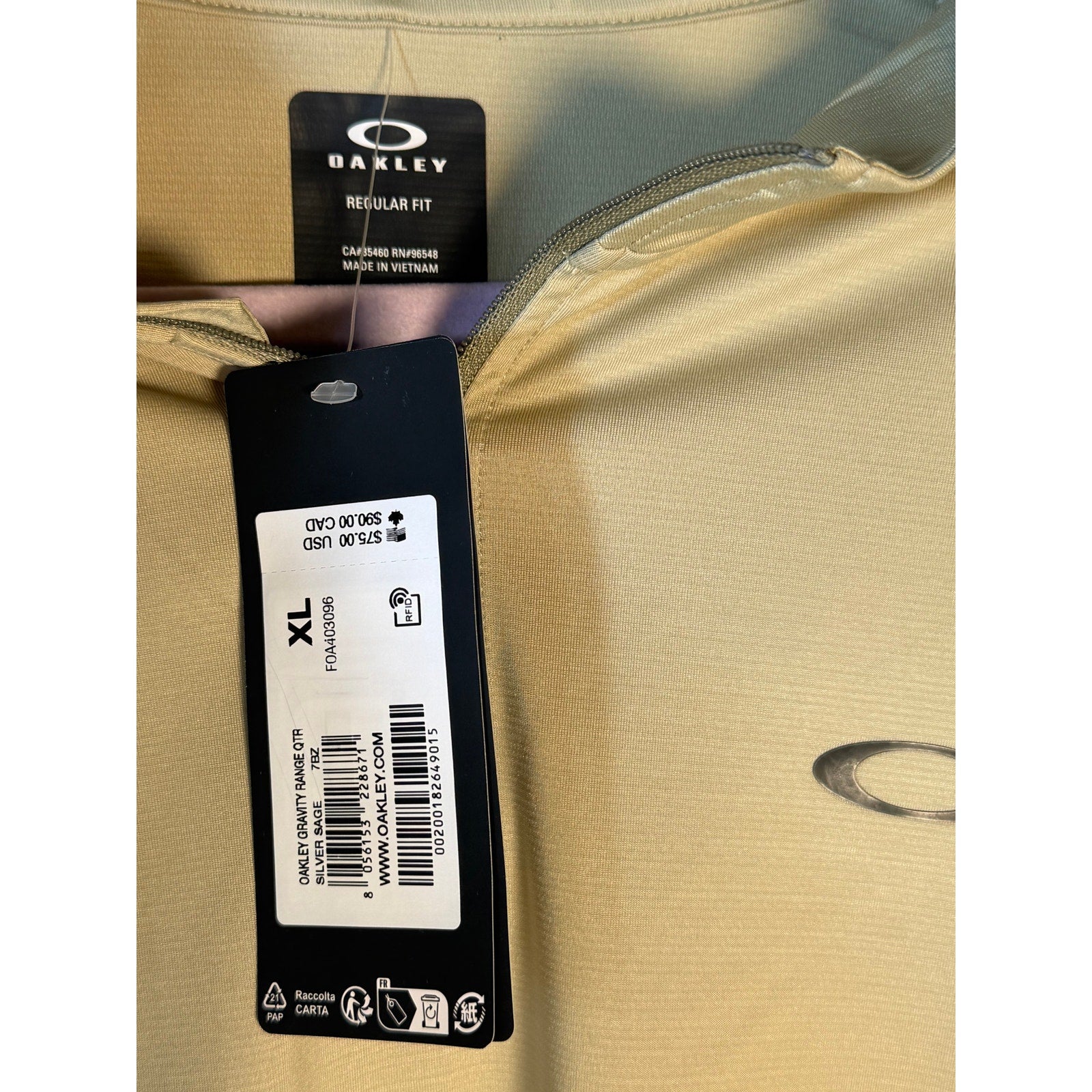 Under Armour Oakley Gravity Range quarter zip pullover in Silver Sage, XL regular fit, showcasing the lightweight fabric and stylish design.