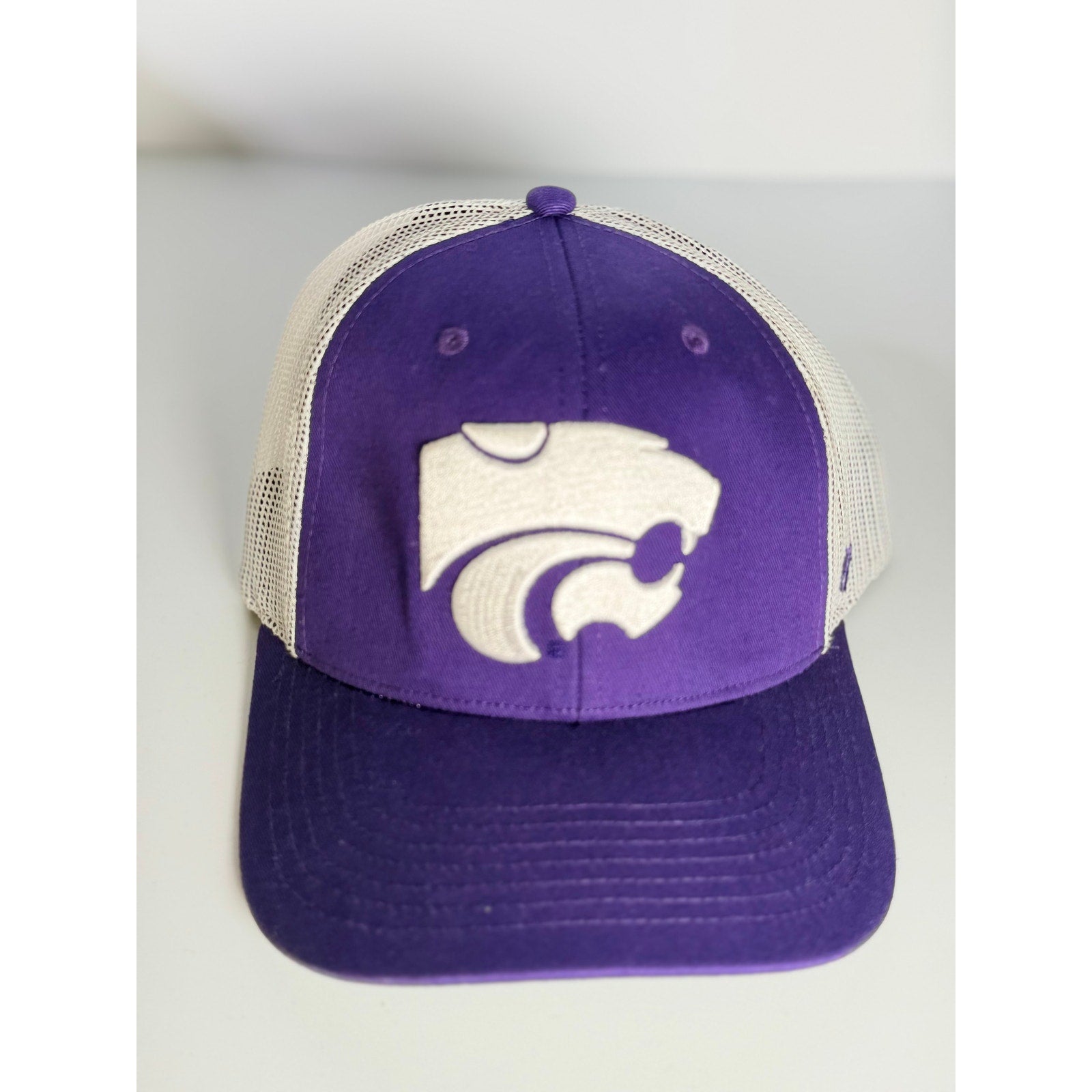 '47 Brand Kansas State Wildcats purple and white adjustable trucker hat with team logo, front panel design, and mesh back.