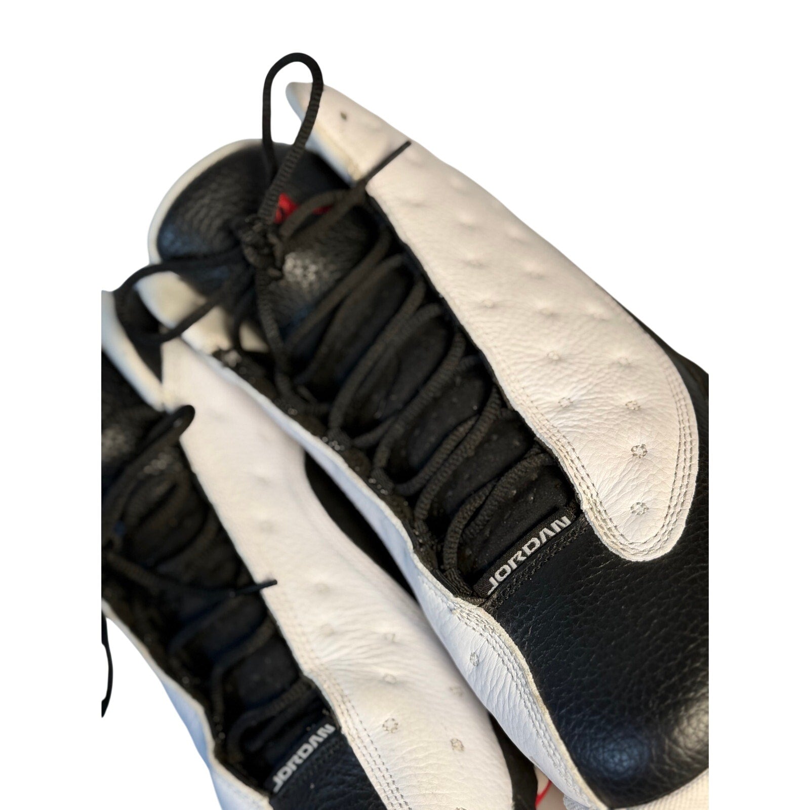 Black and white Air Jordan 13 Retro He Got Game men's athletic sneakers, US size 11.5, featuring signature Jordan design.