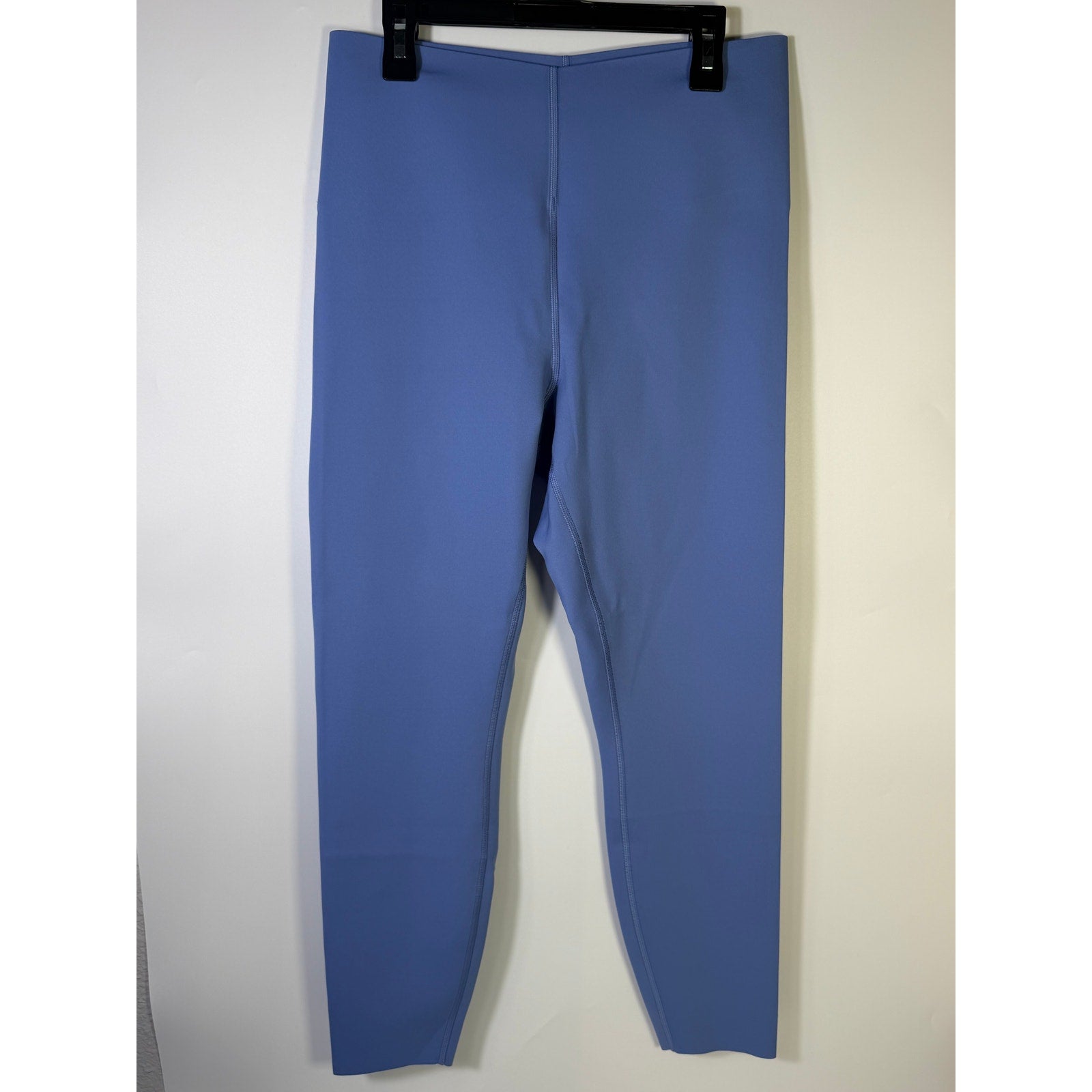 Lululemon Glow Up SHR Tight 25-inch women's blue leggings, form-fitting athletic leggings with a high waistband.