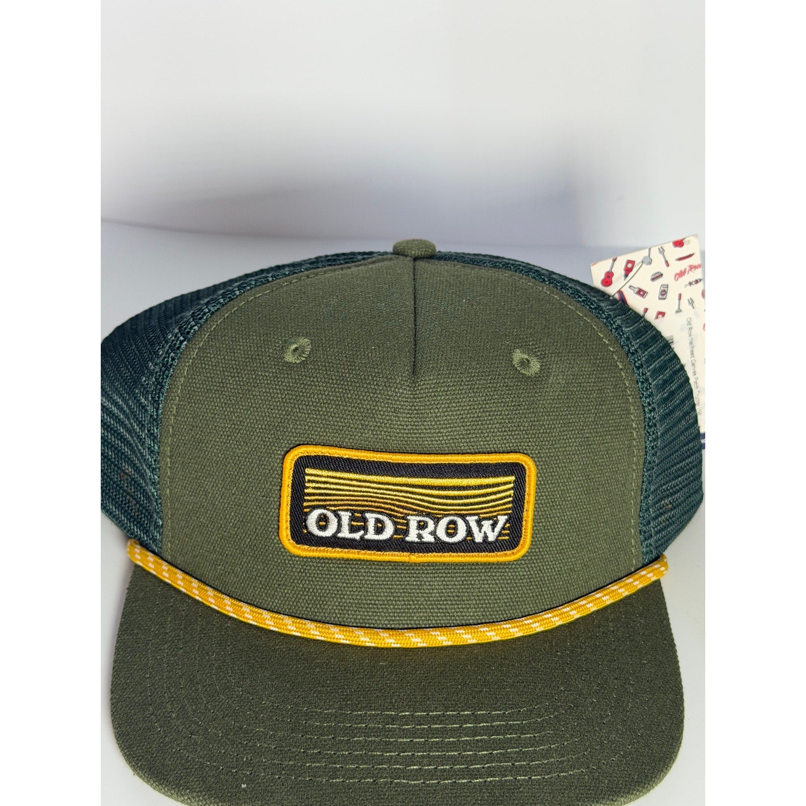 Old Row olive green rope trucker snapback hat with adjustable strap, featuring a classic cap design and branding detail