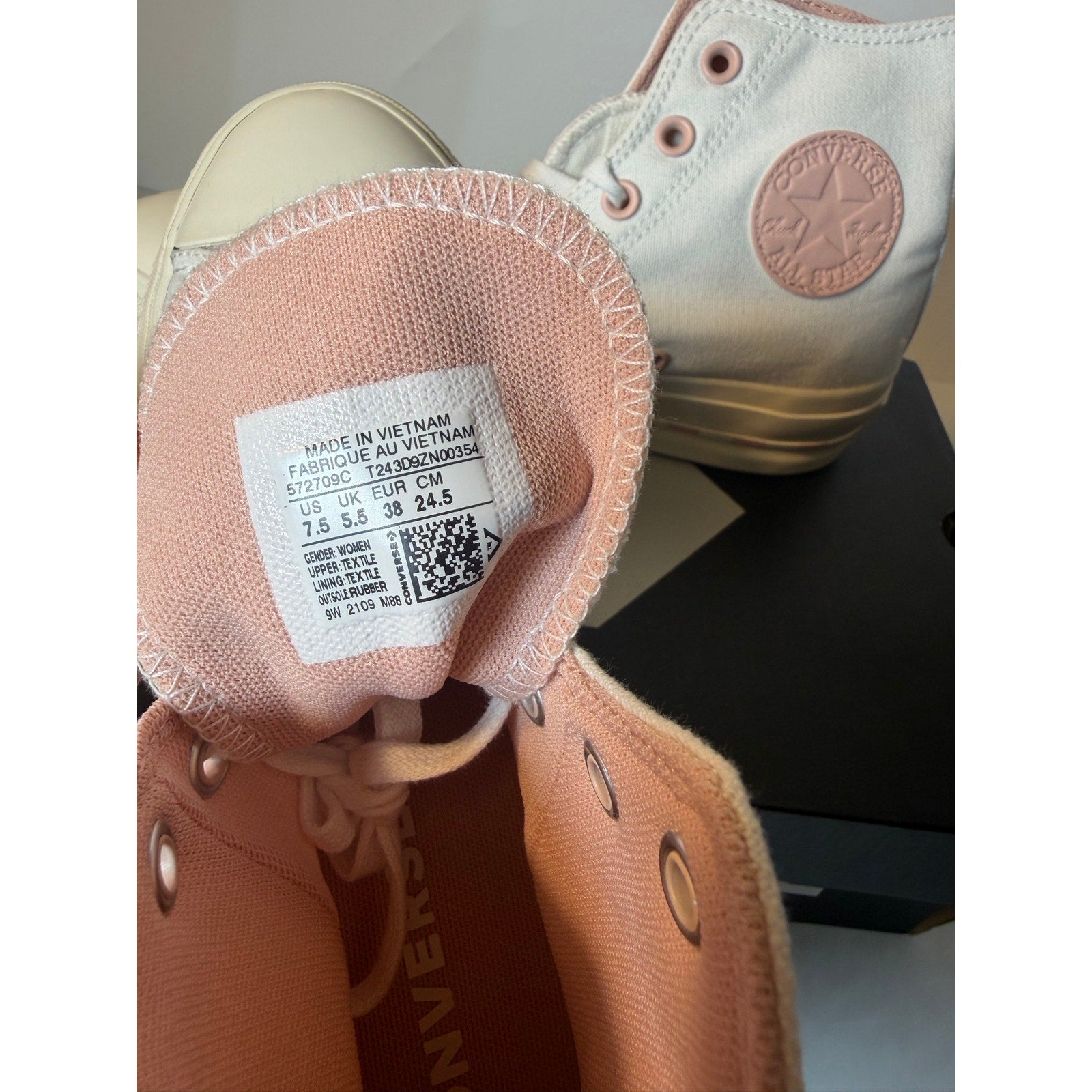 Converse Chuck Taylor All Star Lift High sneakers in white with pink clay accents, women's size 7.5, showing side view.