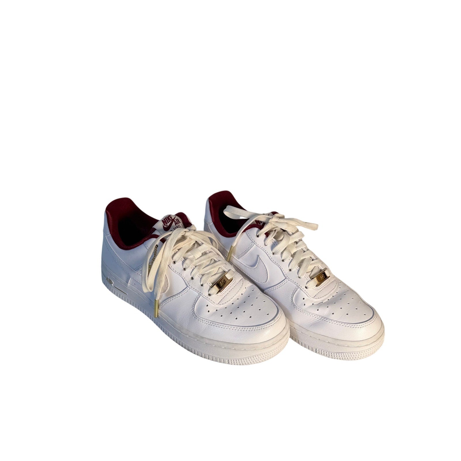 Nike Air Force 1 '07 LV8 men's sneakers in white with team red accents, size 7, front view showing classic design and branding.