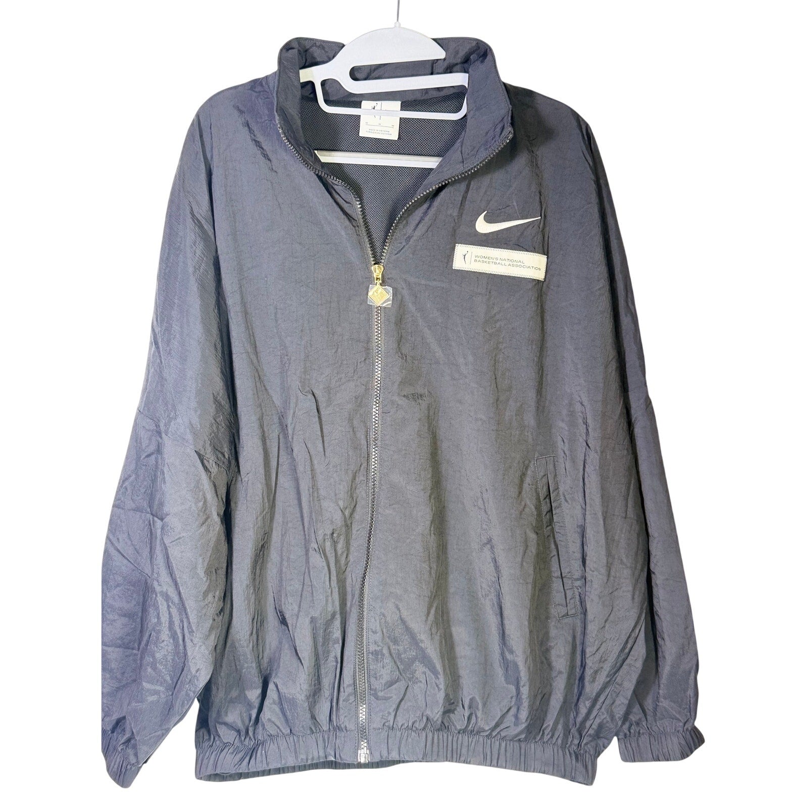 Nike women's WNBA windbreaker jacket in black, full zip, mesh-lined, size M, lightweight jacket with sporty design