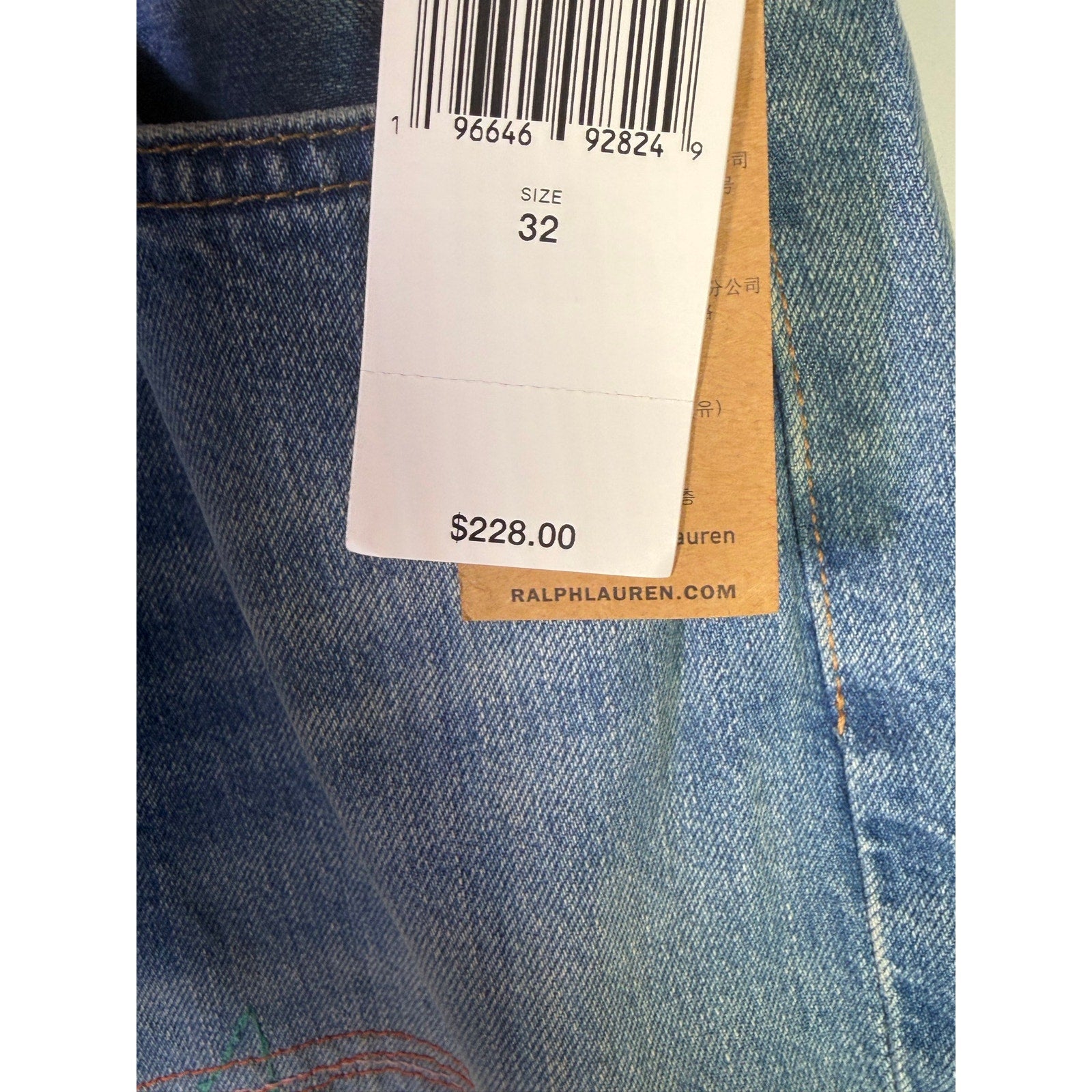 Polo Ralph Lauren men's slim boyfriend patchwork distressed jeans in size 32, featuring a relaxed fit and faded denim details.