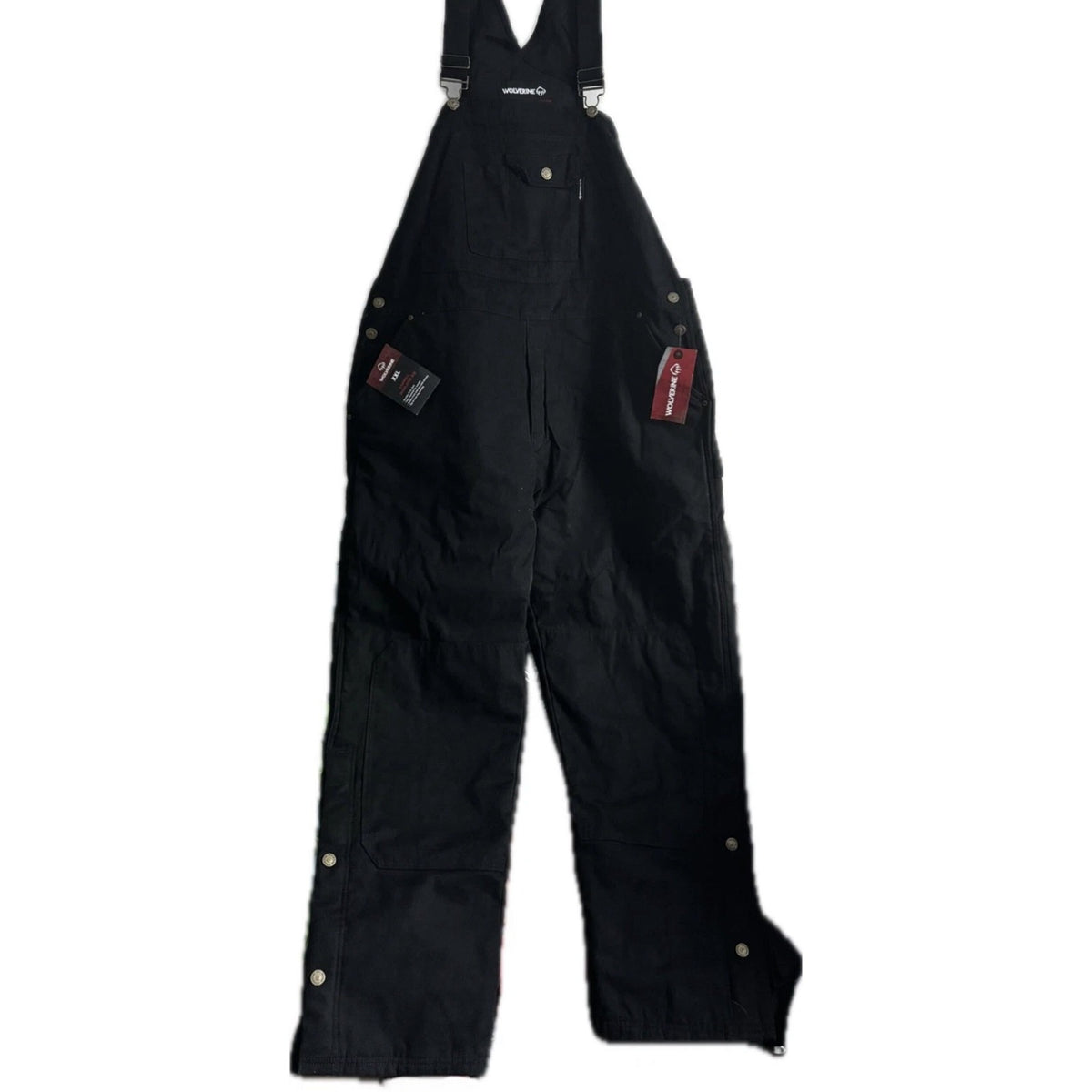 Black Wolverine Sawmill insulated bib overalls for men, size 2XL, with visible insulated fabric and adjustable straps.