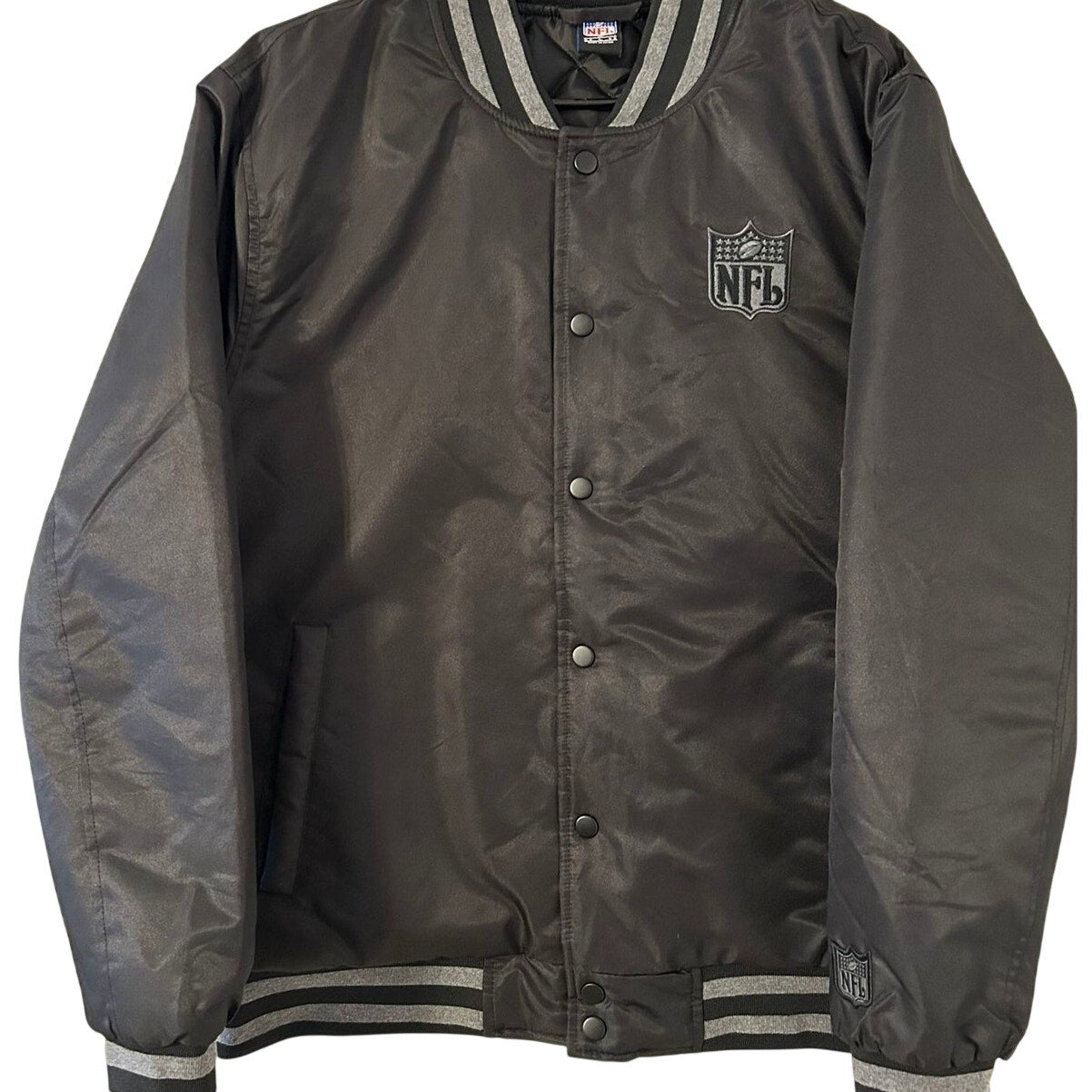 NFL men's varsity bomber jacket in black and gray with a snap front, size large, featuring team logo and athletic style.