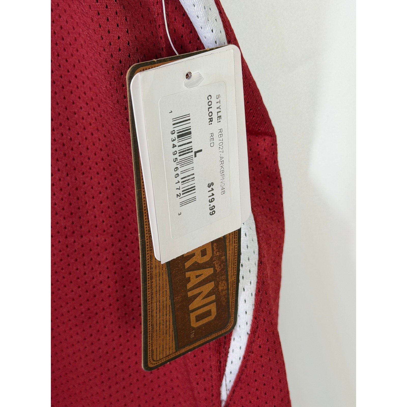 Red men's Retro Brand Arkansas Razorbacks #10 basketball jersey with team logo and player number, size large.
