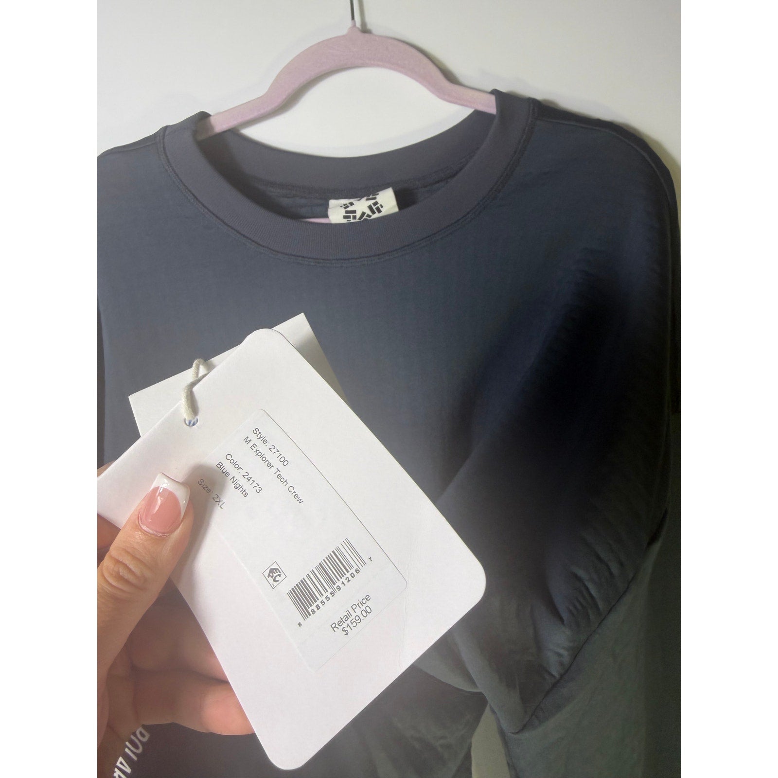 Women's Obermeyer Explorer Tech Crew Pullover Sweatshirt in Blue Nights, showing the front view with a relaxed fit and crew neckline.