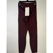 Lululemon Glow Up SHR Tight 25-inch women's leggings in size 4, close-up of black athletic leggings with reflective details