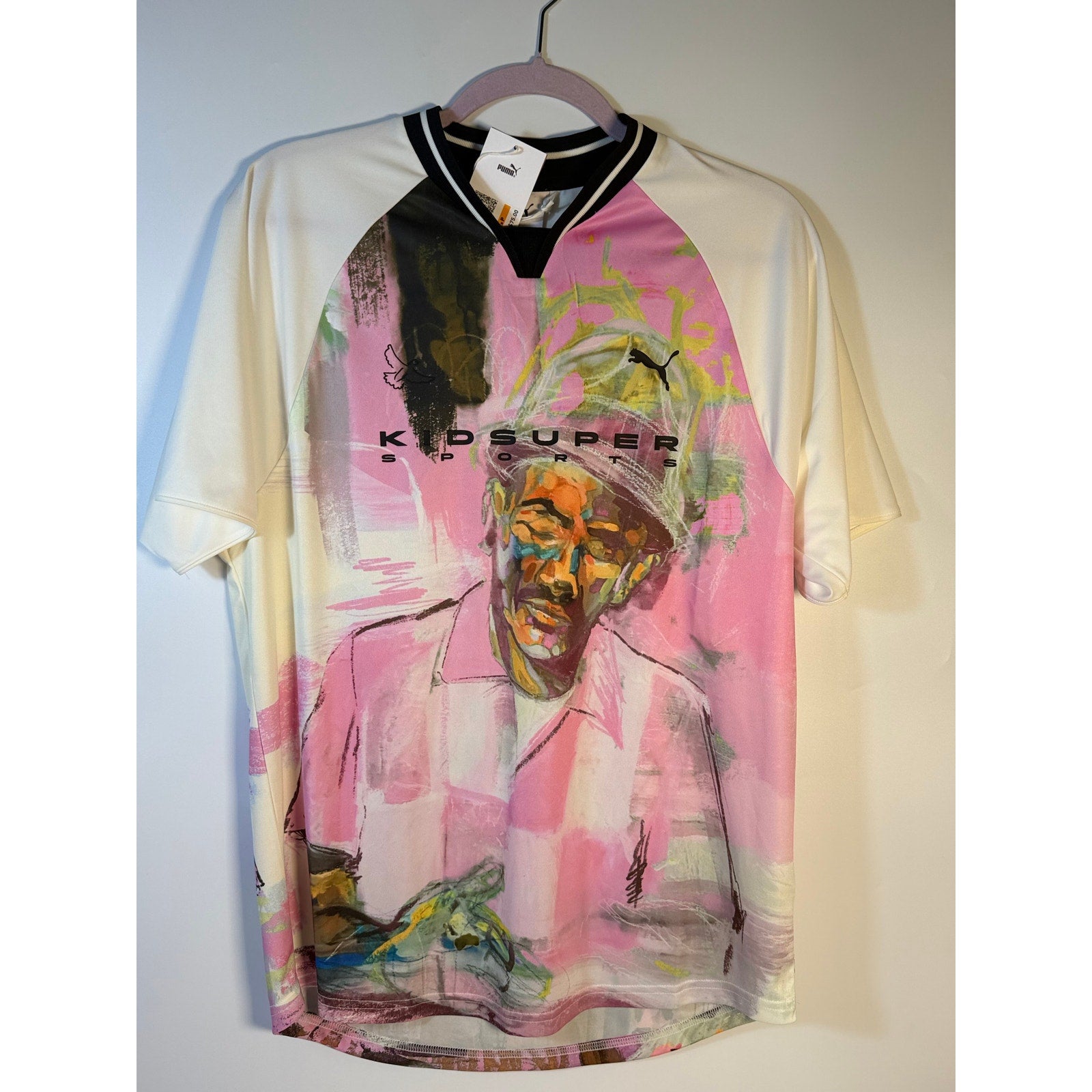 PUMA x KidSuper soccer jersey T-shirt in warm white with graphic design, men's size S, new with tags.