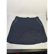 Dunning women's navy golf skort with built-in athletic shorts, size L, featuring a sleek, sporty design and comfortable fit.