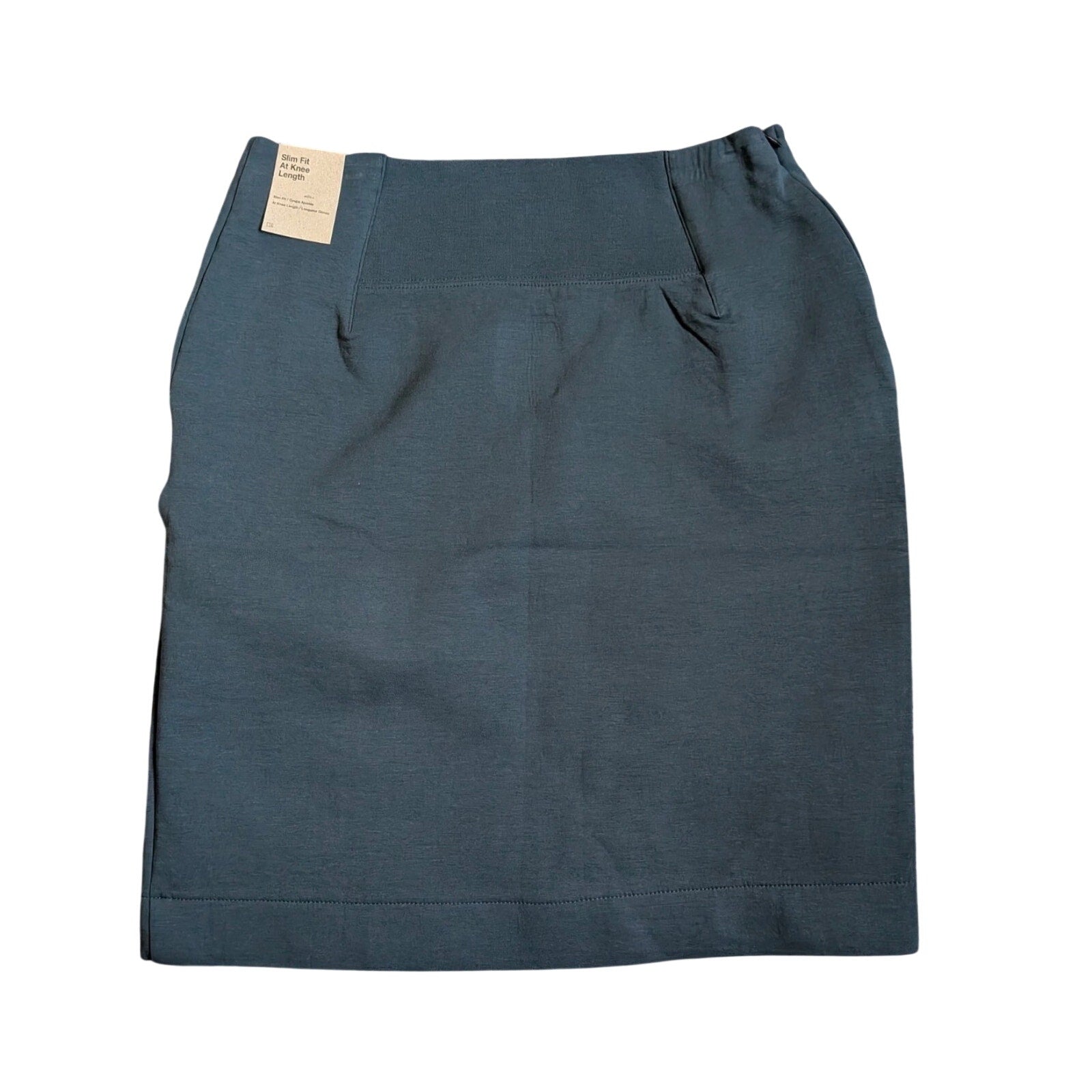 Nike women's slim fit knee-length athletic skirt in small size, shown on a model with a lightweight, breathable fabric design.